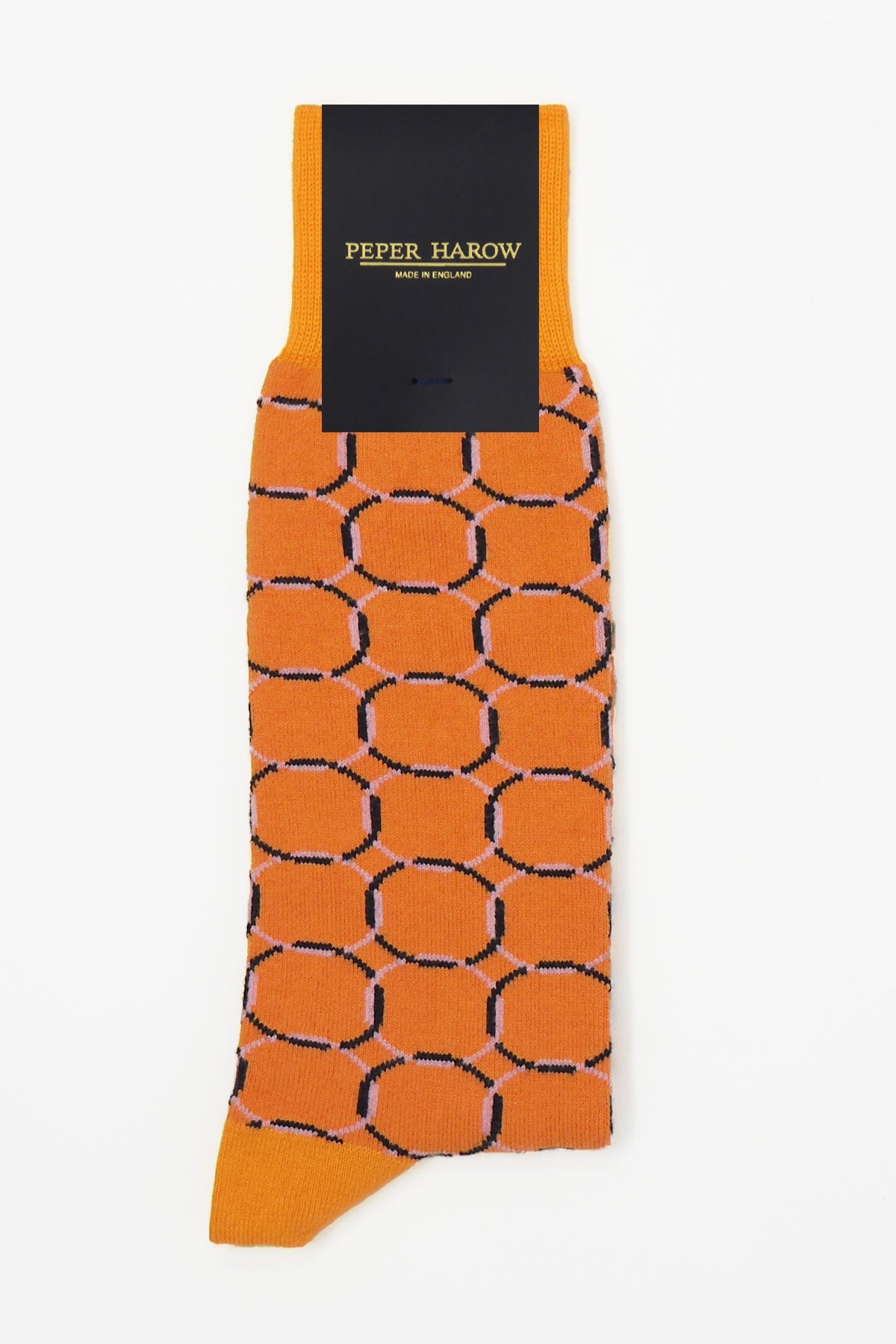 A pair of vibrant orange Linked Men's Socks with a yellow pattern, showcasing luxury and style.