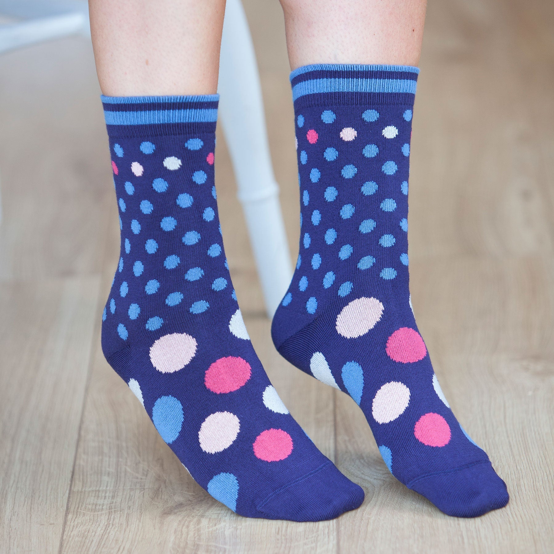 Mary Women's Socks in Navy featuring colorful polka dots in pink, grey, magenta, and blue, made from luxurious Supima cotton.