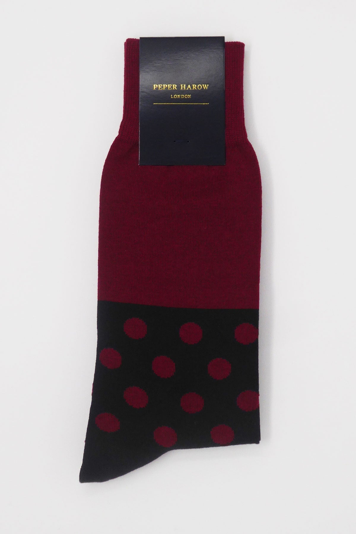 Mayfair Men's Socks in burgundy with black and burgundy polka dots and green-grey sole, showcasing luxury and style.