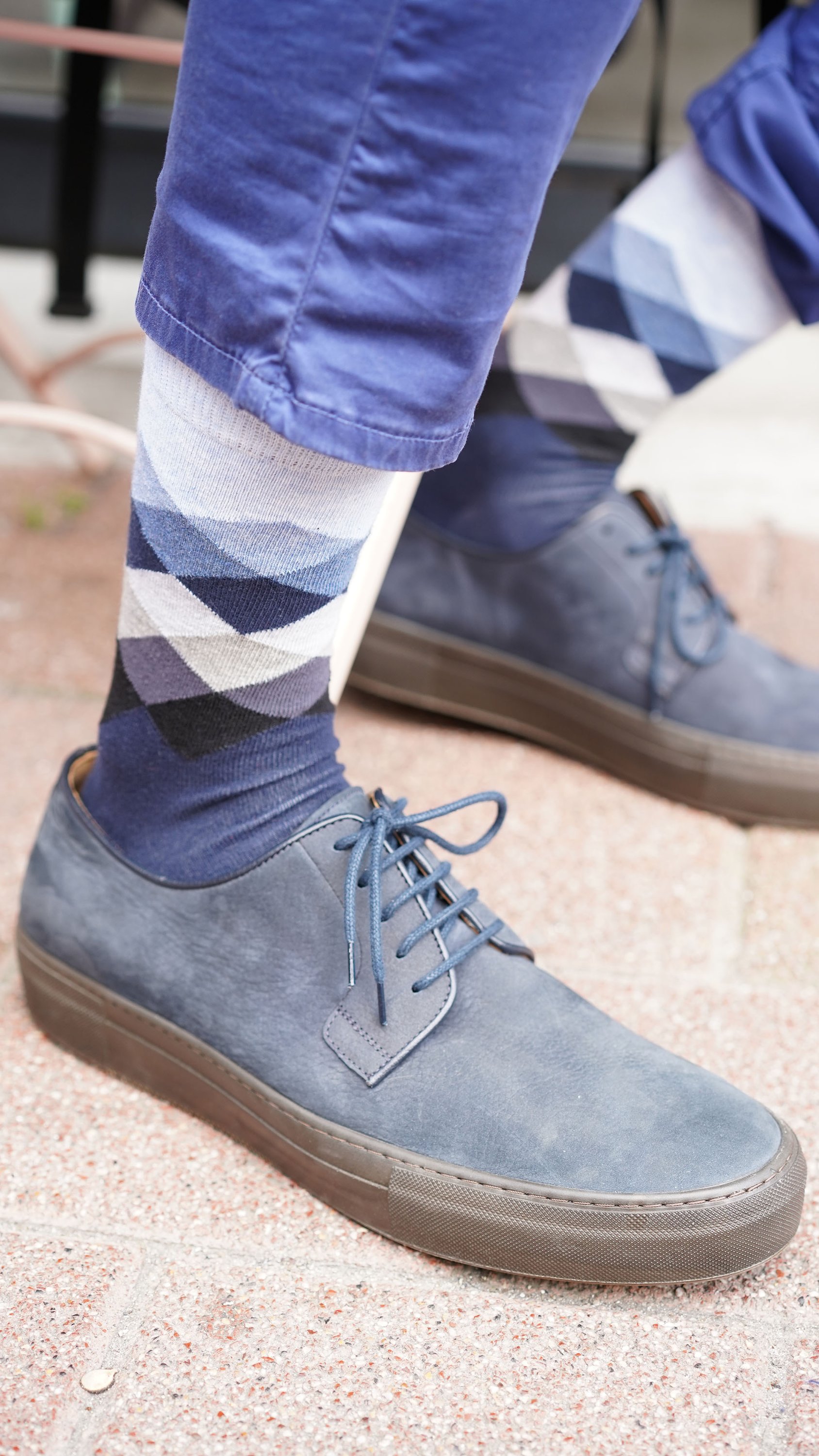 Men's Azure Diamond Socks featuring a vibrant diamond pattern in blue and white, perfect for adding style to any outfit.