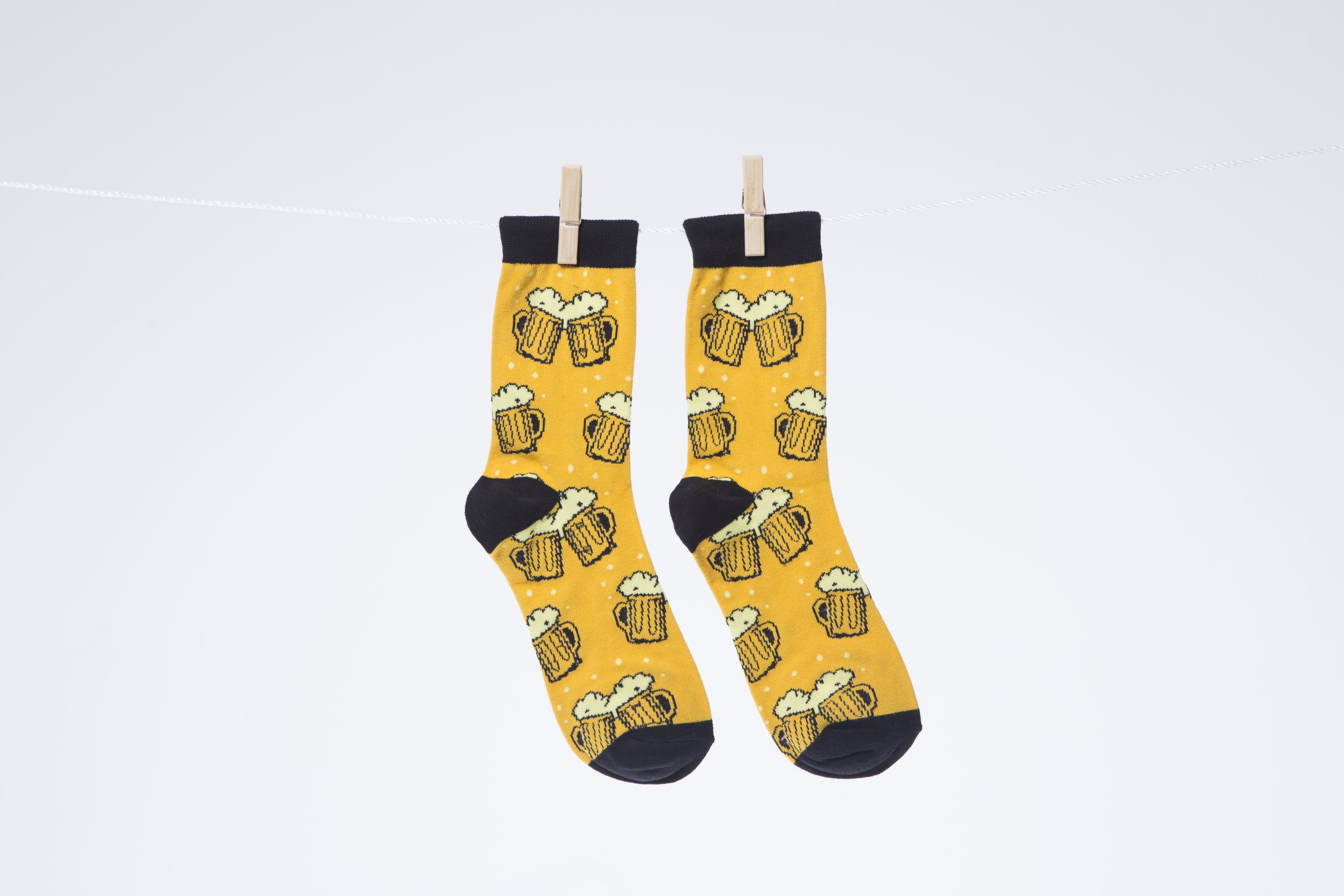 Men's Beer Socks made from premium combed cotton, featuring a fun beer-themed design, suitable for shoe sizes 7-12.