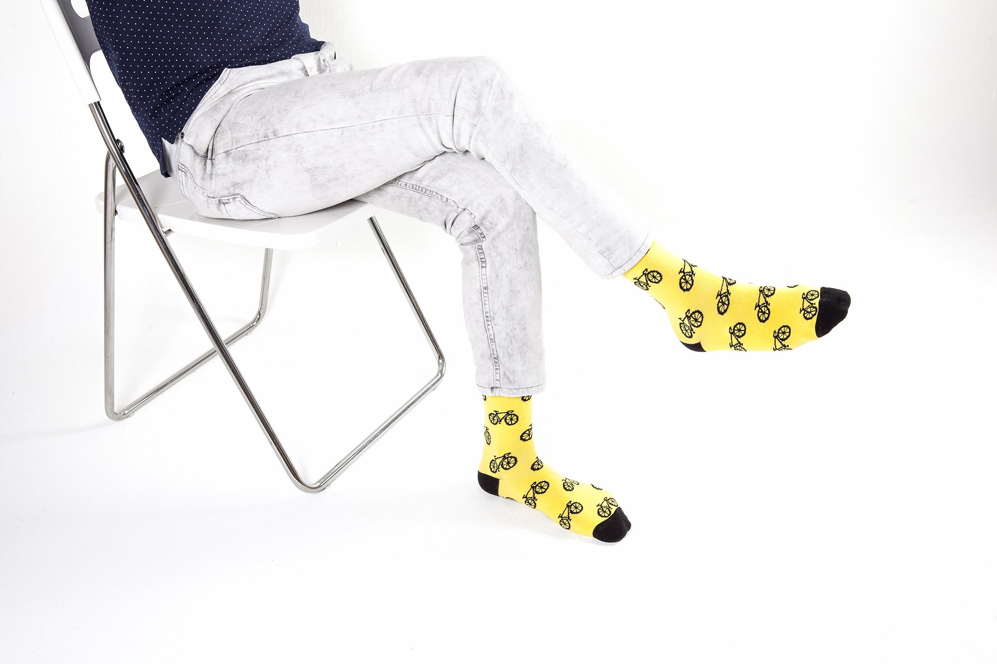 A pair of colorful men's bicycle socks featuring trendy patterns and made from soft Turkish cotton, ideal for comfort and style.