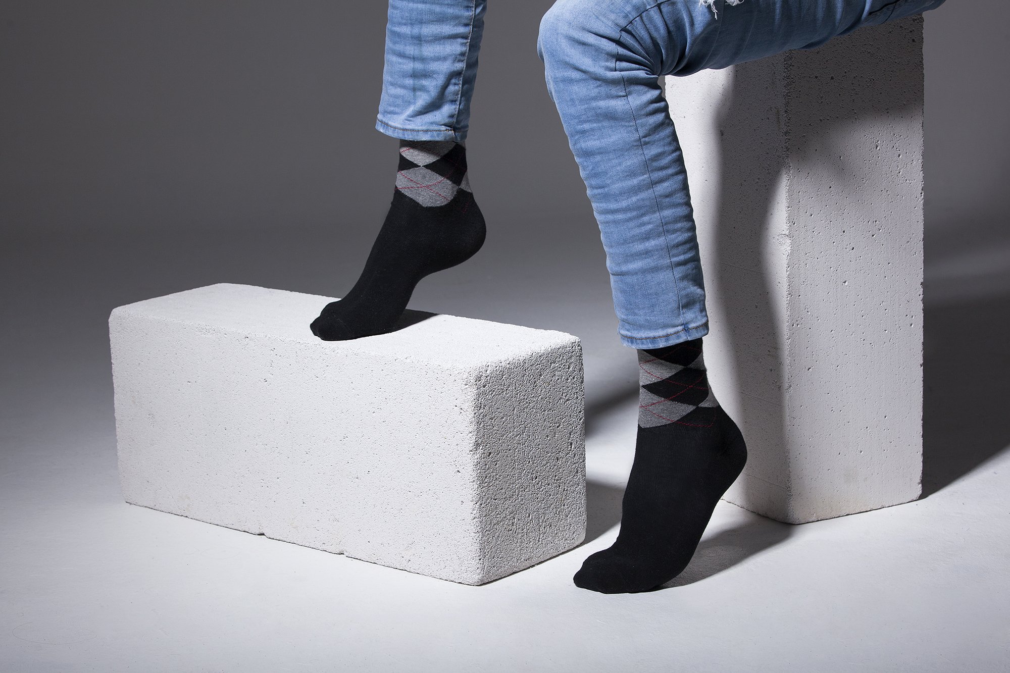 Men's black argyle socks featuring a stylish pattern, made from soft Turkish cotton for comfort.