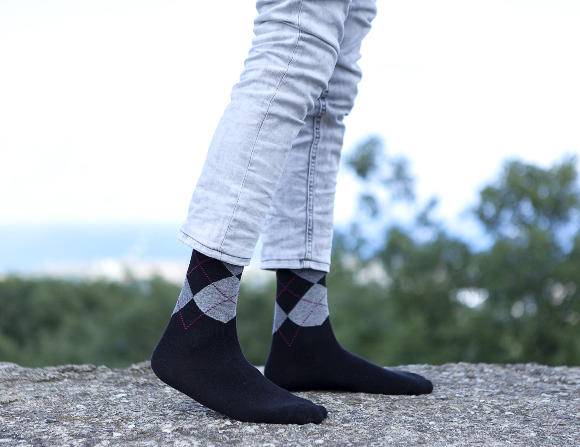 Men's black argyle socks featuring a stylish pattern, made from soft Turkish cotton for comfort.