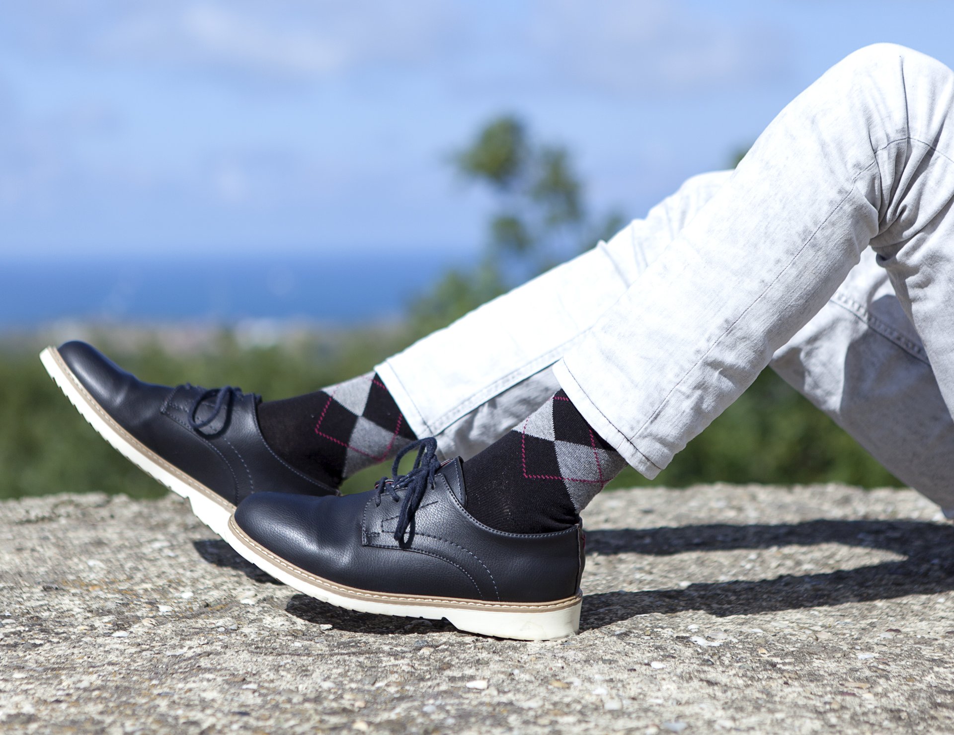 Men's black argyle socks featuring a stylish pattern, made from soft Turkish cotton for comfort.