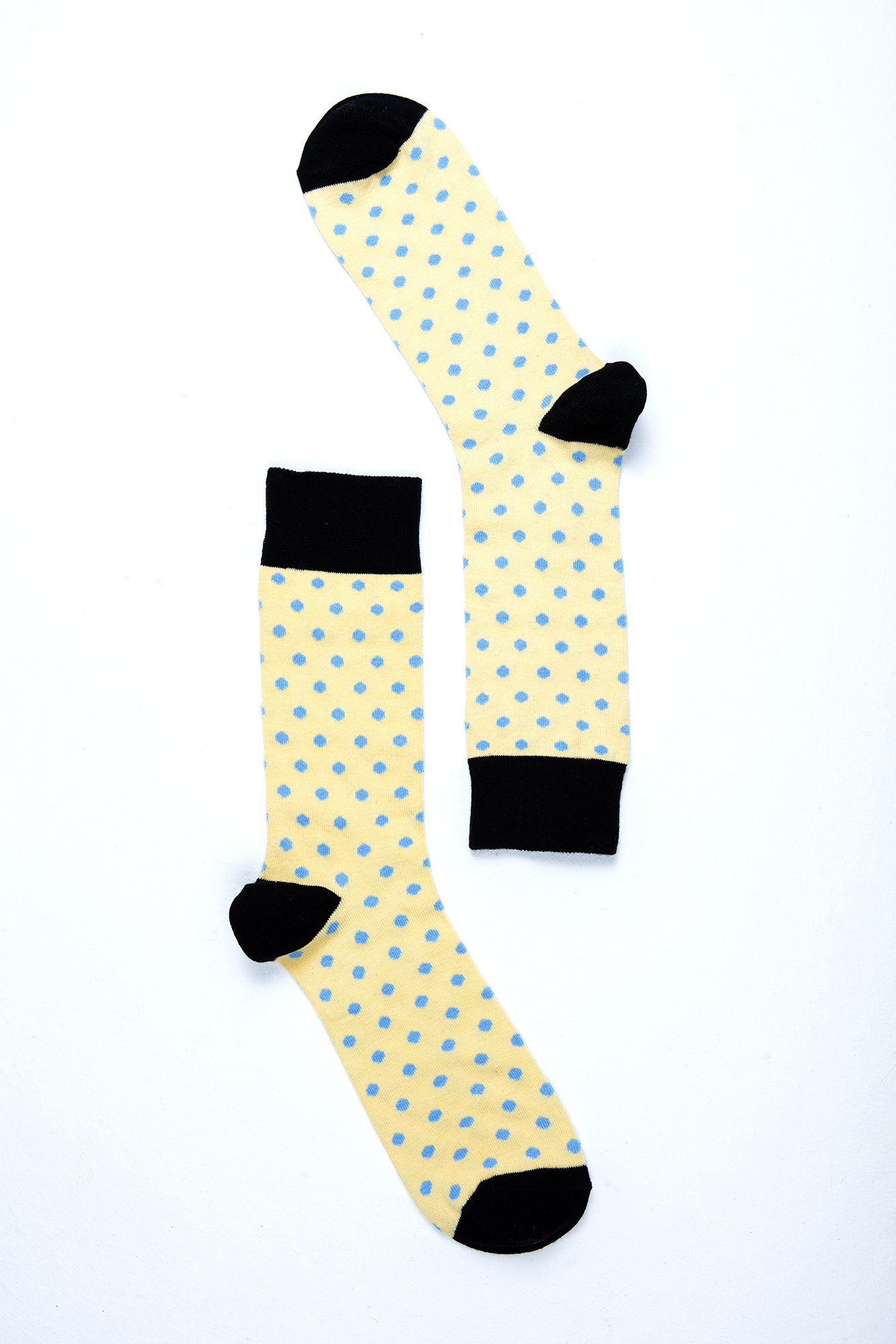 Men's Buttermilk Dot Socks featuring a colorful dot pattern, made from soft Turkish cotton for comfort and style.