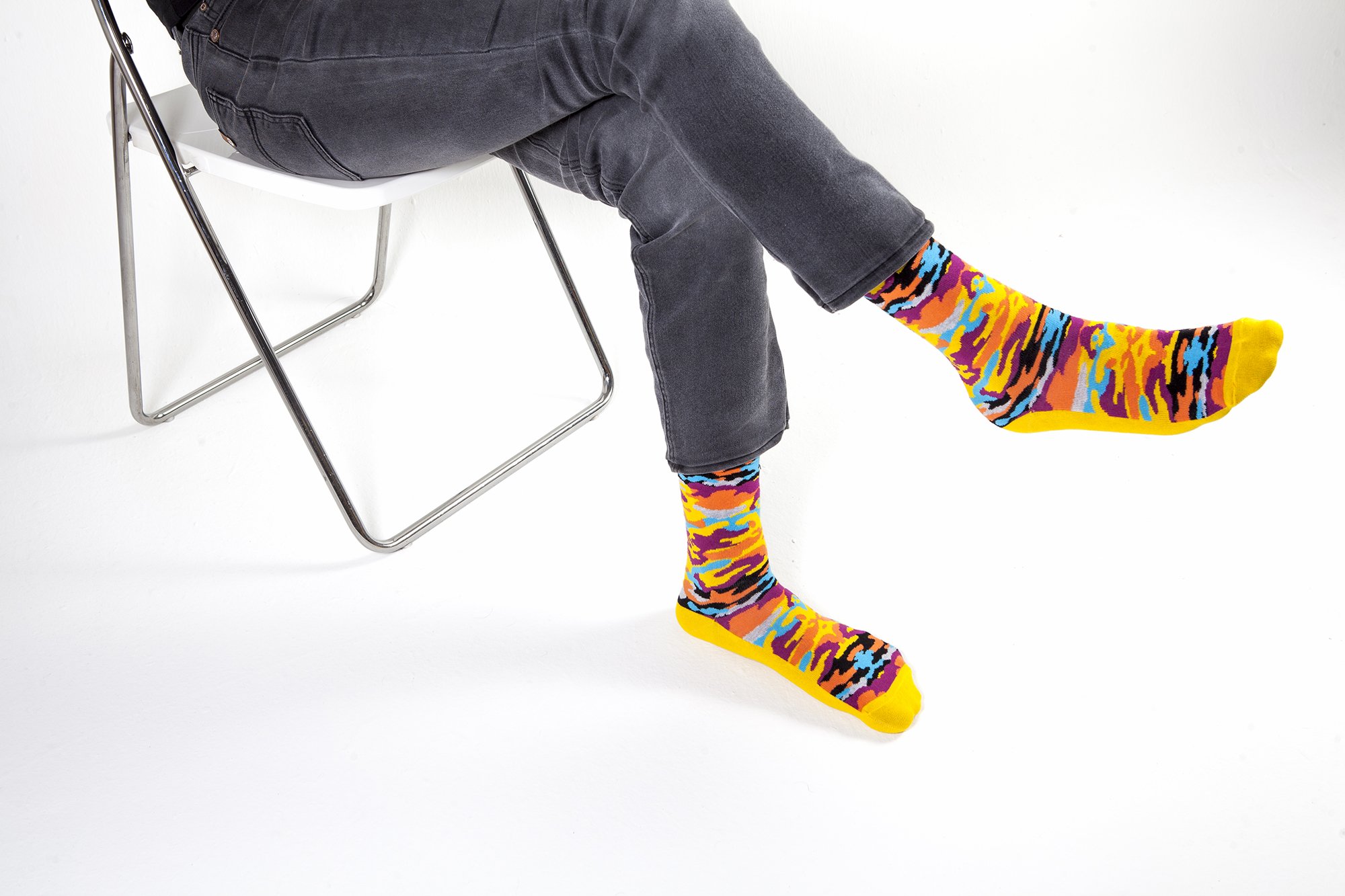 Men's Canary Camo Socks featuring vibrant colors and trendy camo design, perfect for adding style to any outfit.