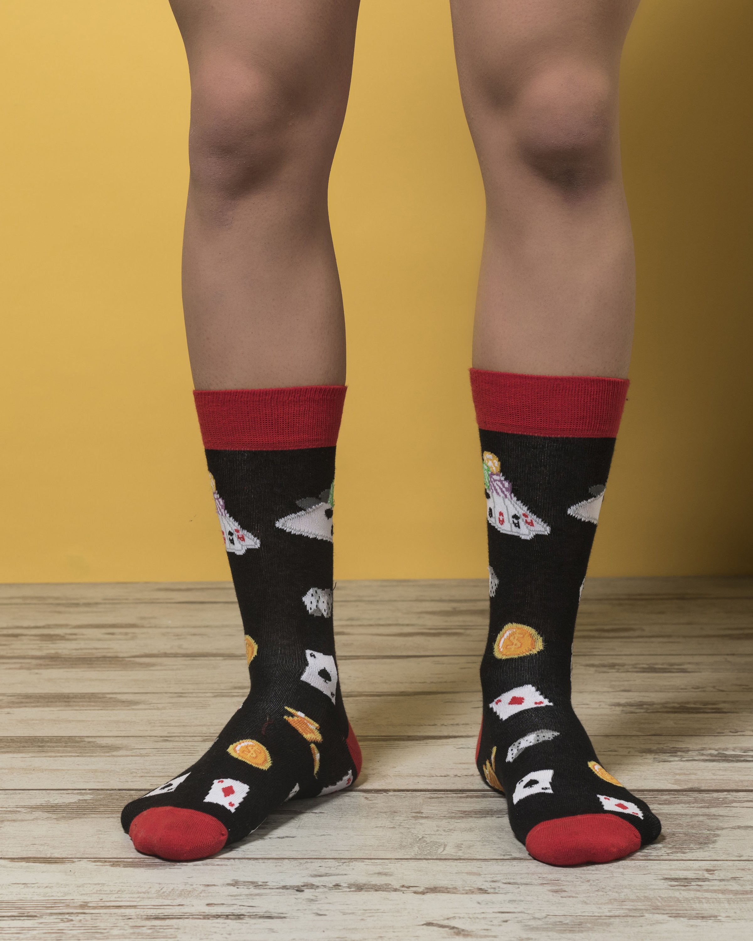 Men's Card Table Socks featuring colorful designs and premium cotton material, perfect for adding style and comfort to any outfit.