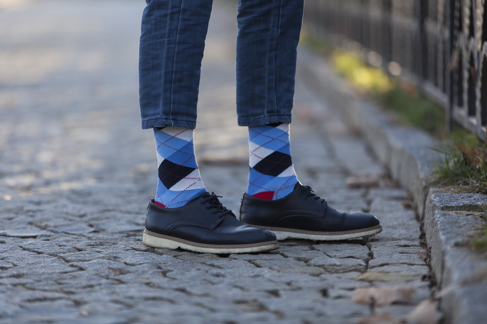 Men's cerulean red argyle socks featuring a vibrant pattern, perfect for adding style to any outfit.