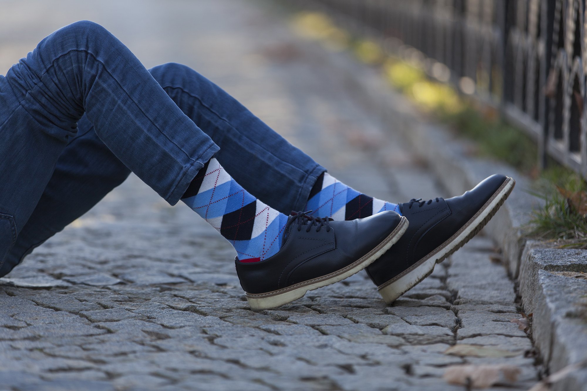 Men's cerulean red argyle socks featuring a vibrant pattern, perfect for adding style to any outfit.