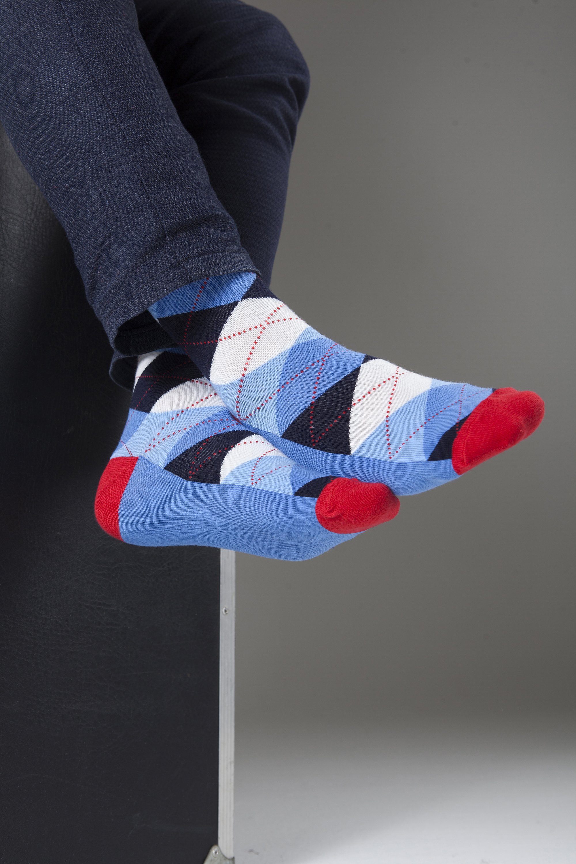 Men's cerulean red argyle socks featuring a vibrant pattern, perfect for adding style to any outfit.