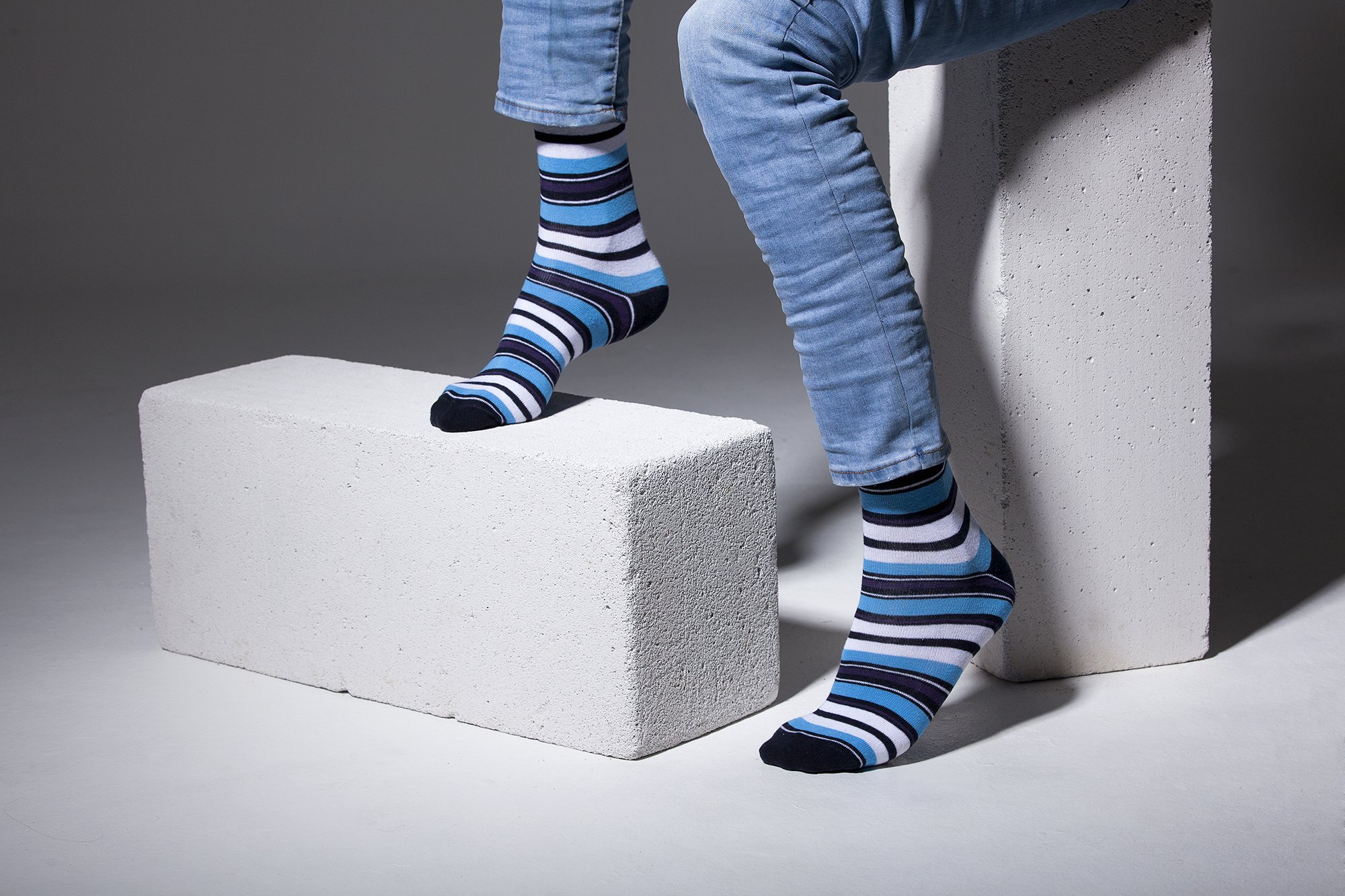 Men's Cerulean Stripe Socks featuring vibrant colors and trendy patterns, perfect for adding style to any outfit.