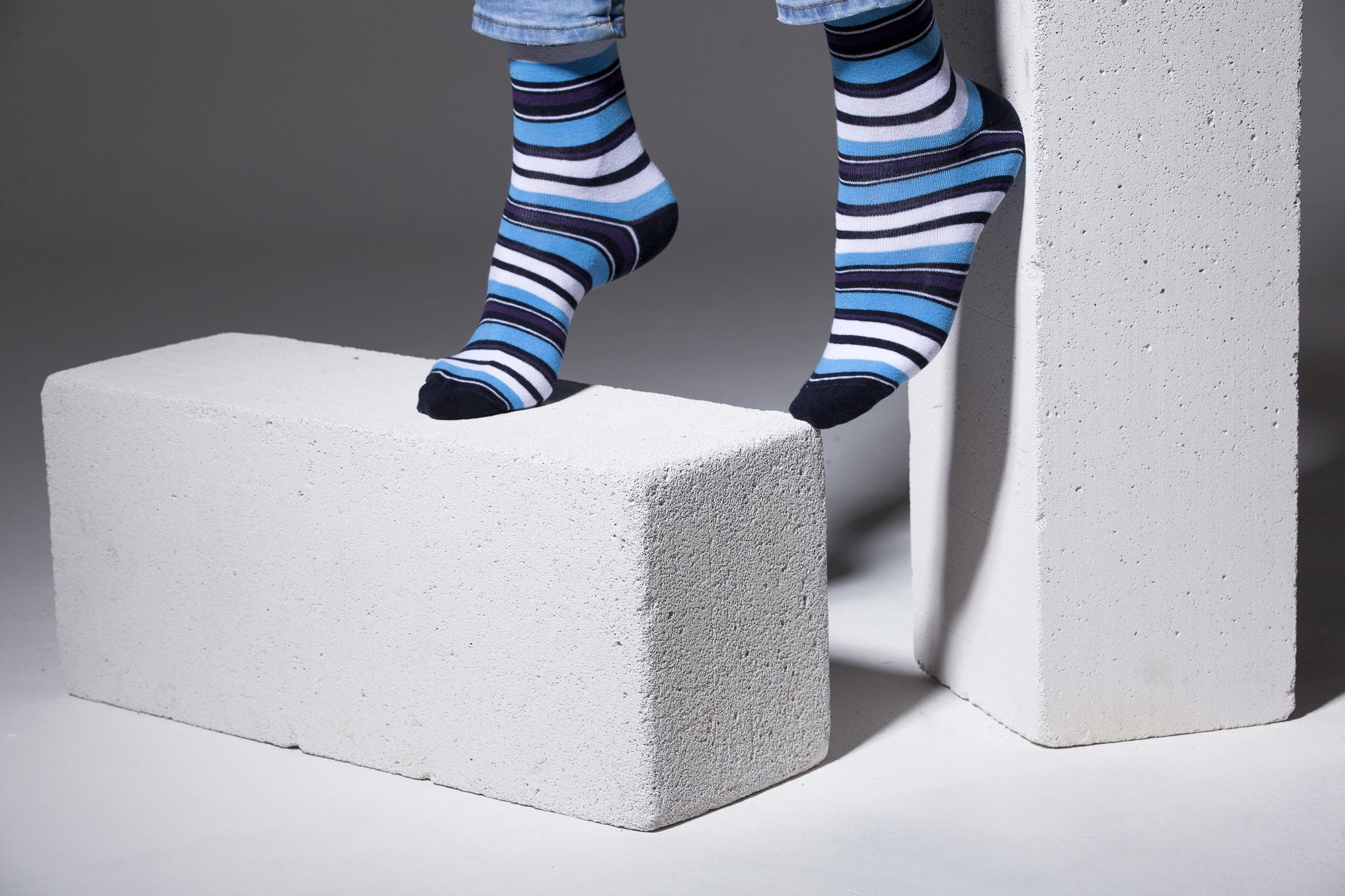 Men's Cerulean Stripe Socks featuring vibrant colors and trendy patterns, perfect for adding style to any outfit.