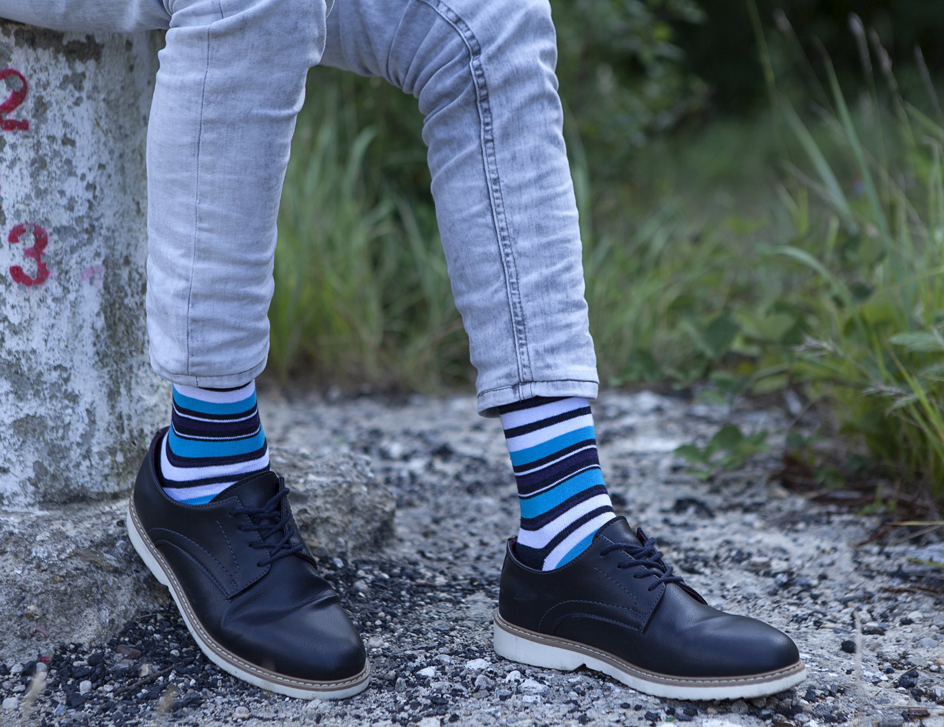 Men's Cerulean Stripe Socks featuring vibrant colors and trendy patterns, perfect for adding style to any outfit.