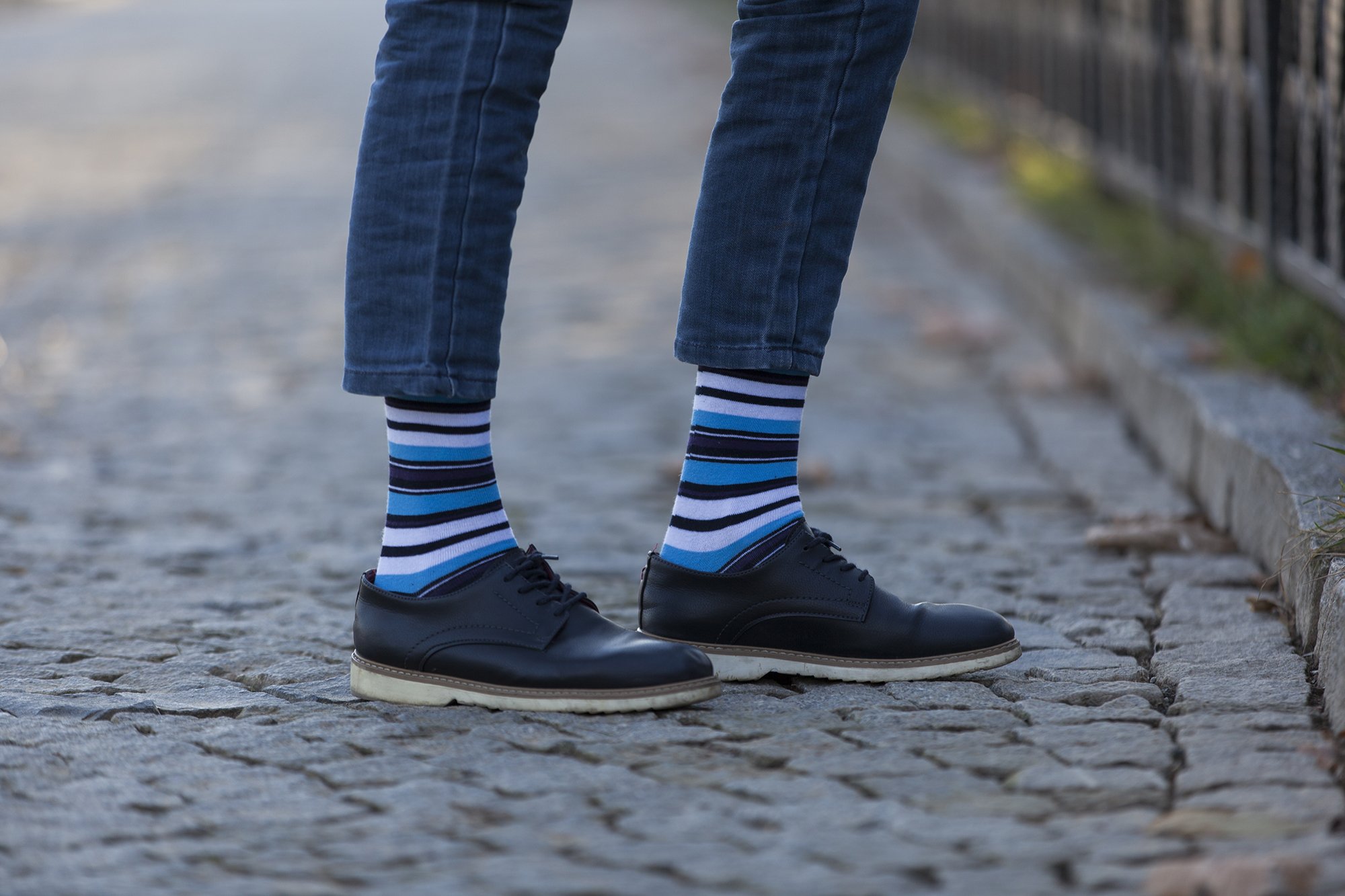 Men's Cerulean Stripe Socks featuring vibrant colors and trendy patterns, perfect for adding style to any outfit.