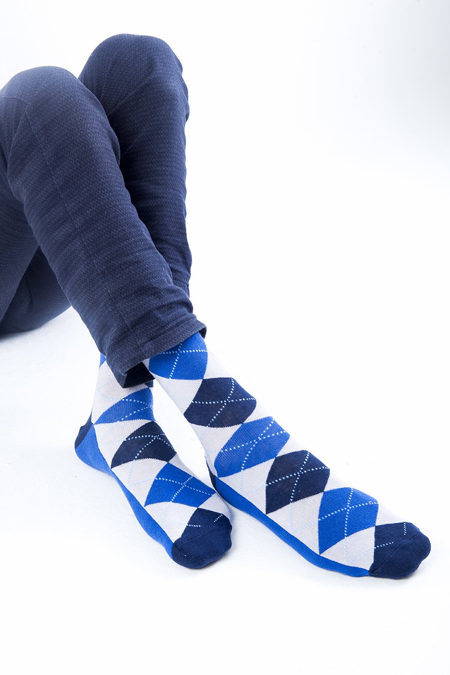 Men's Cobalt Stone Argyle Socks featuring a vibrant pattern and soft cotton material, perfect for stylish comfort.