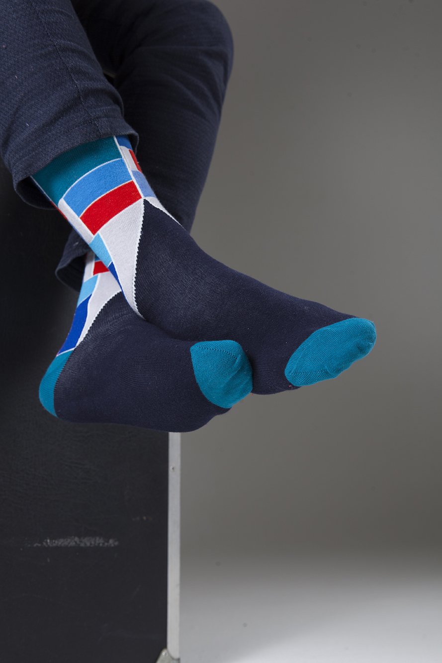 Men's Cool Mix Set Socks featuring vibrant colors and trendy patterns, perfect for adding style to any outfit.