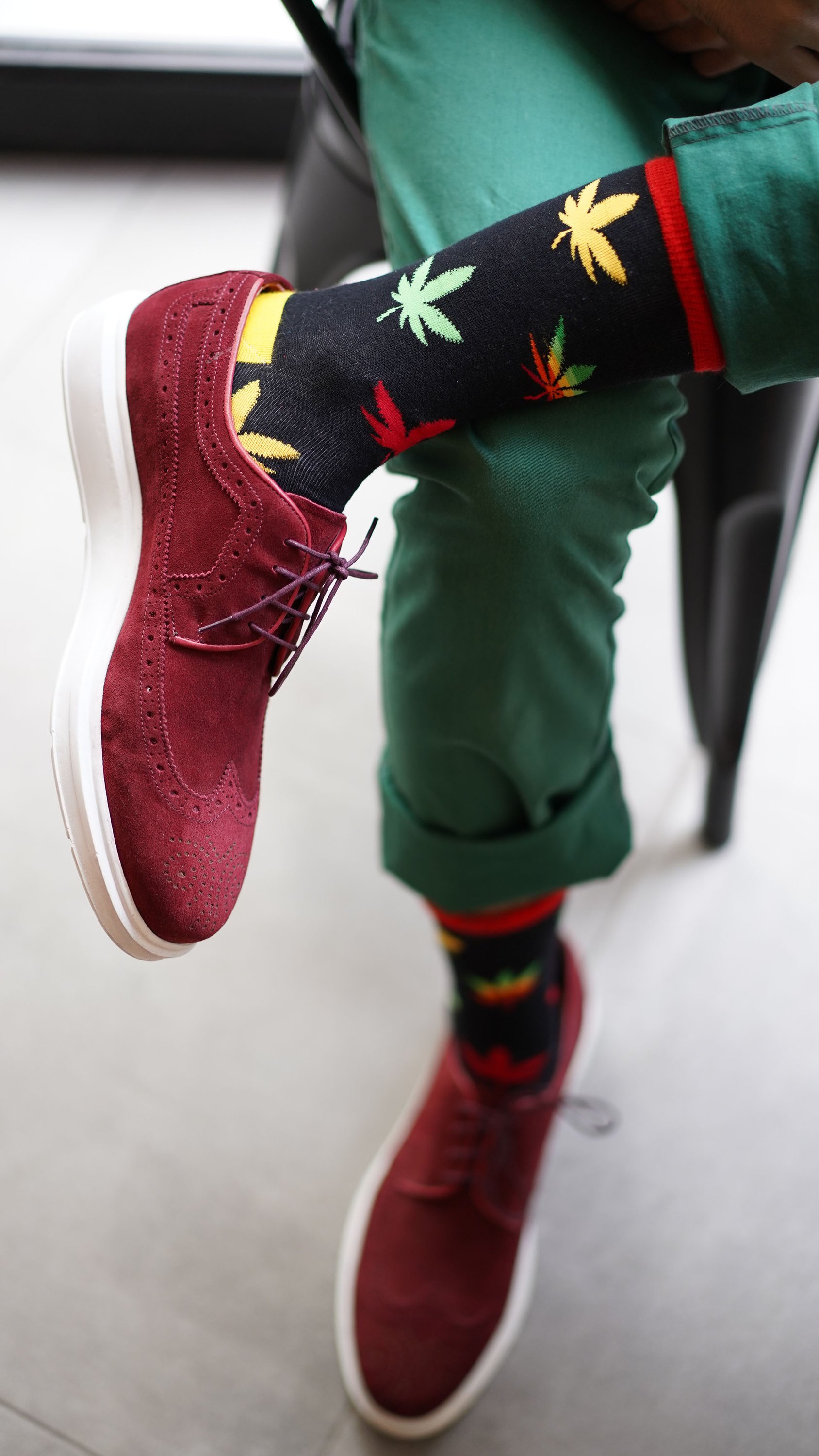 Men's Colorful Weed Socks featuring vibrant patterns and comfortable fabric, perfect for adding style to any outfit.