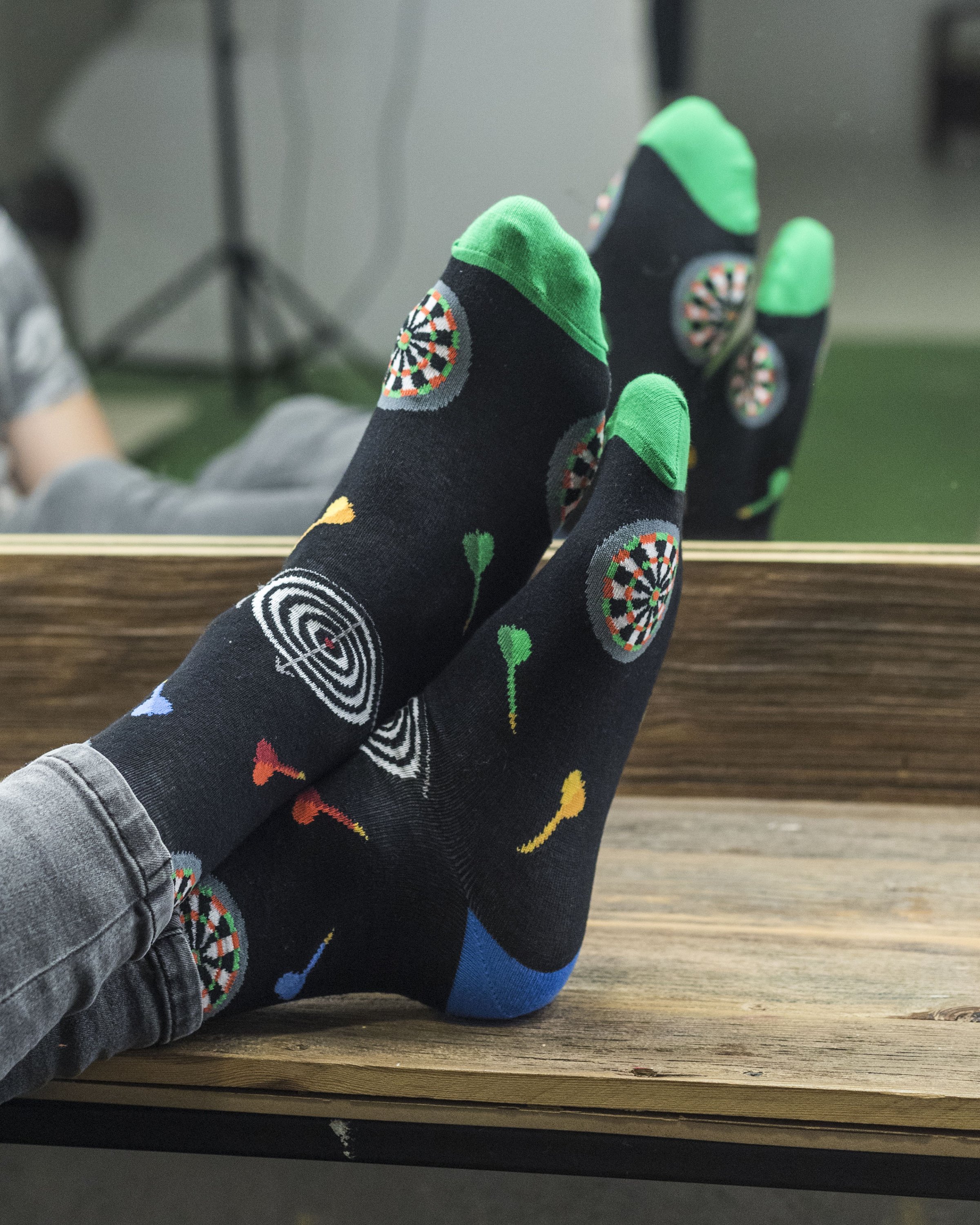 Men's Dart Socks featuring colorful designs and patterns, made from soft Turkish cotton for comfort.