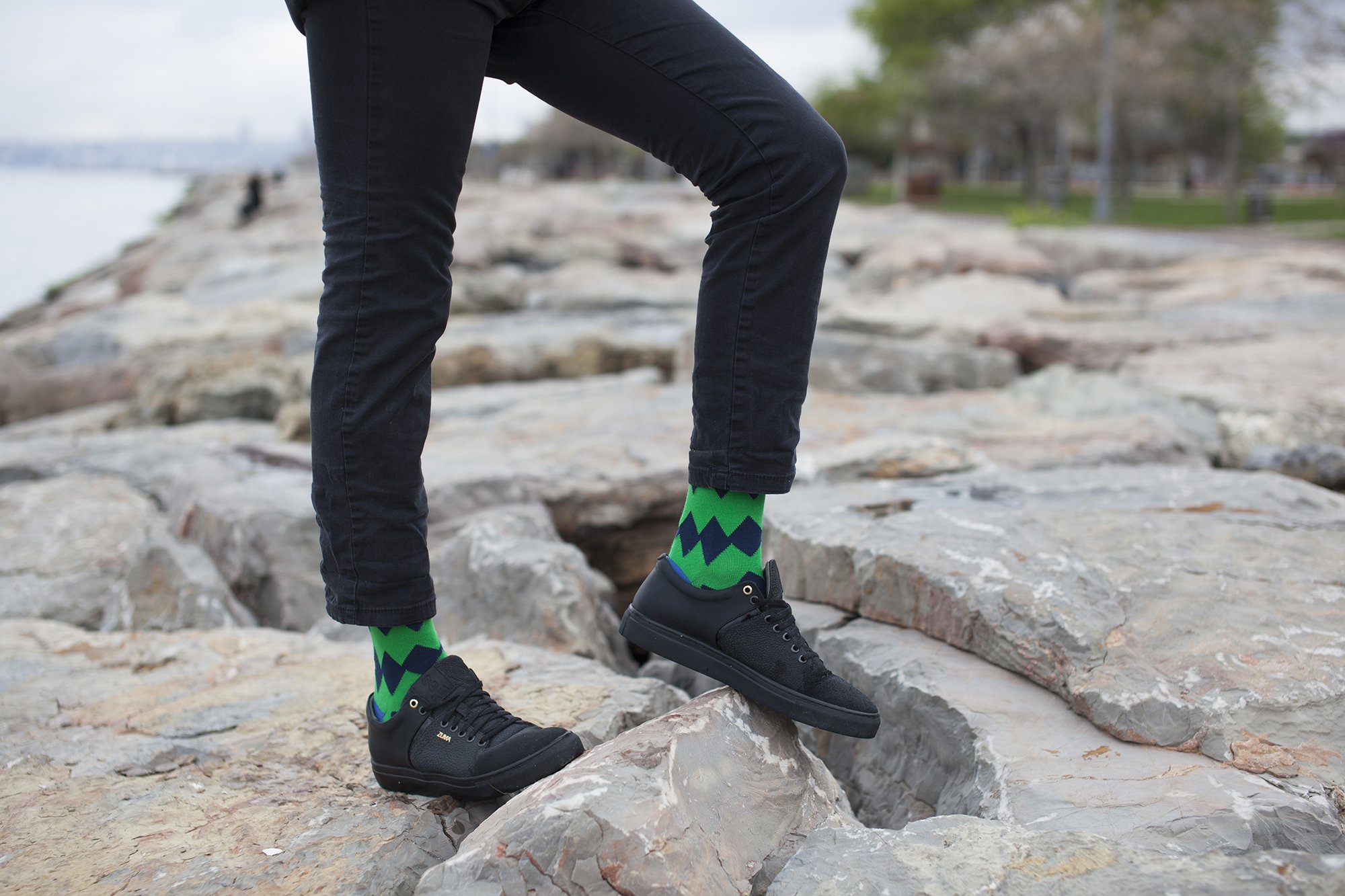 Men's Emerald Zig Zag Socks featuring a vibrant zig-zag pattern in emerald green, made from soft Turkish cotton for comfort.