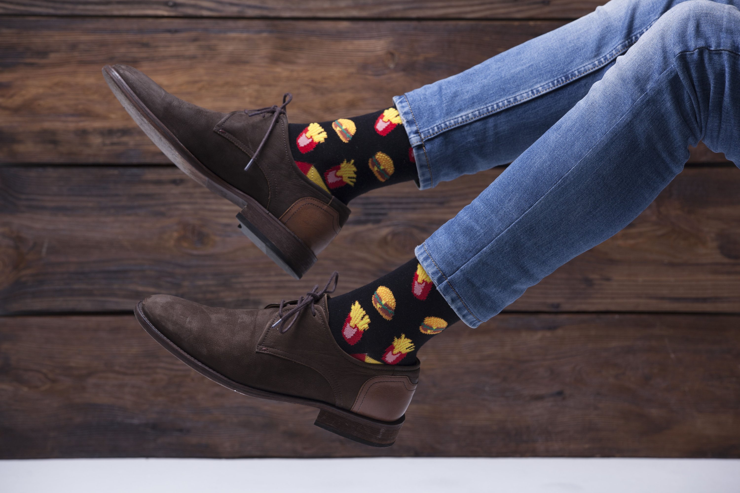 A pair of stylish Men's Fries Socks featuring a fun fries design, made from soft combed cotton for comfort.