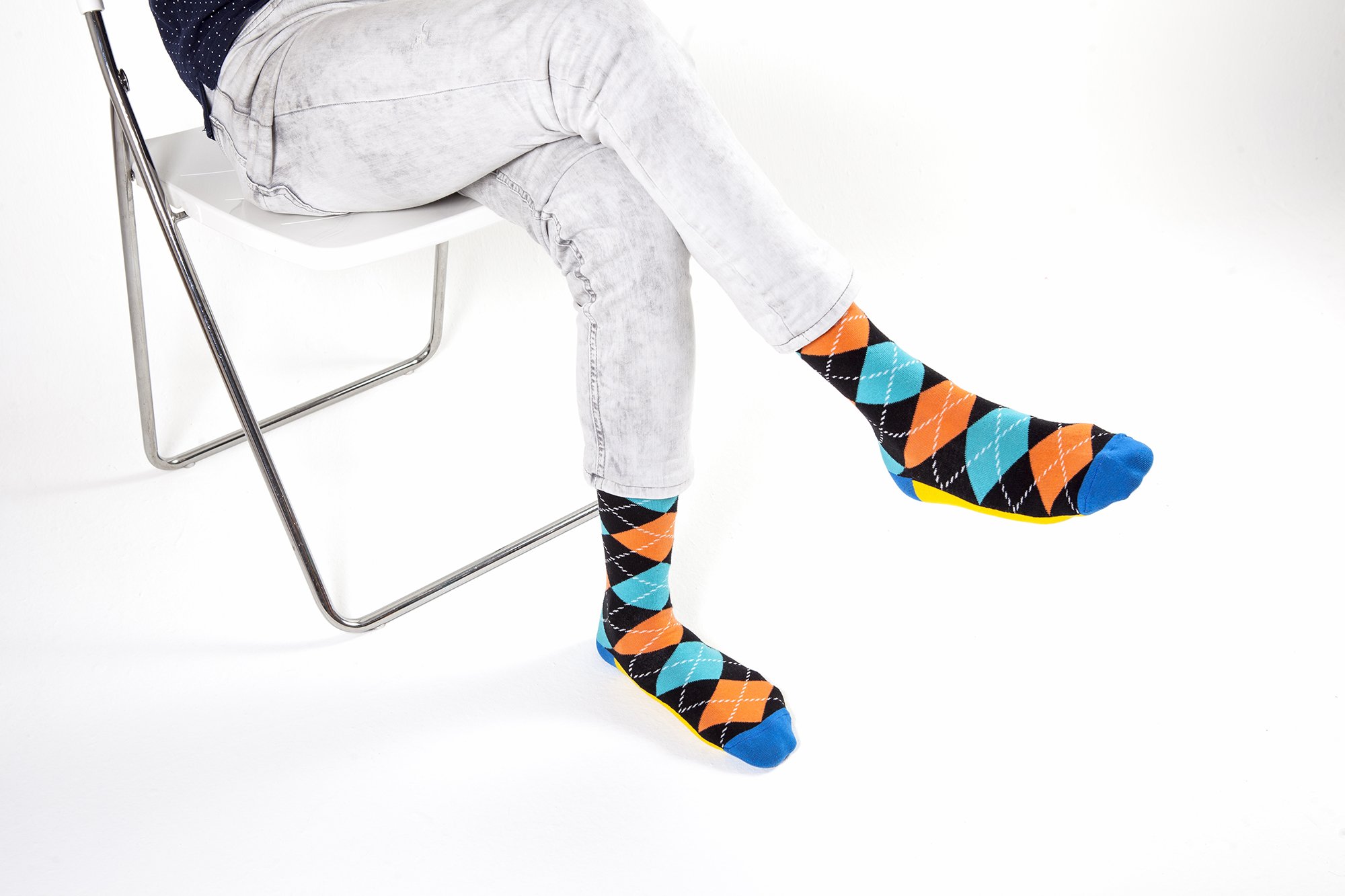 Men's Funky Argyle Socks featuring vibrant colors and trendy patterns, perfect for adding style to any outfit.