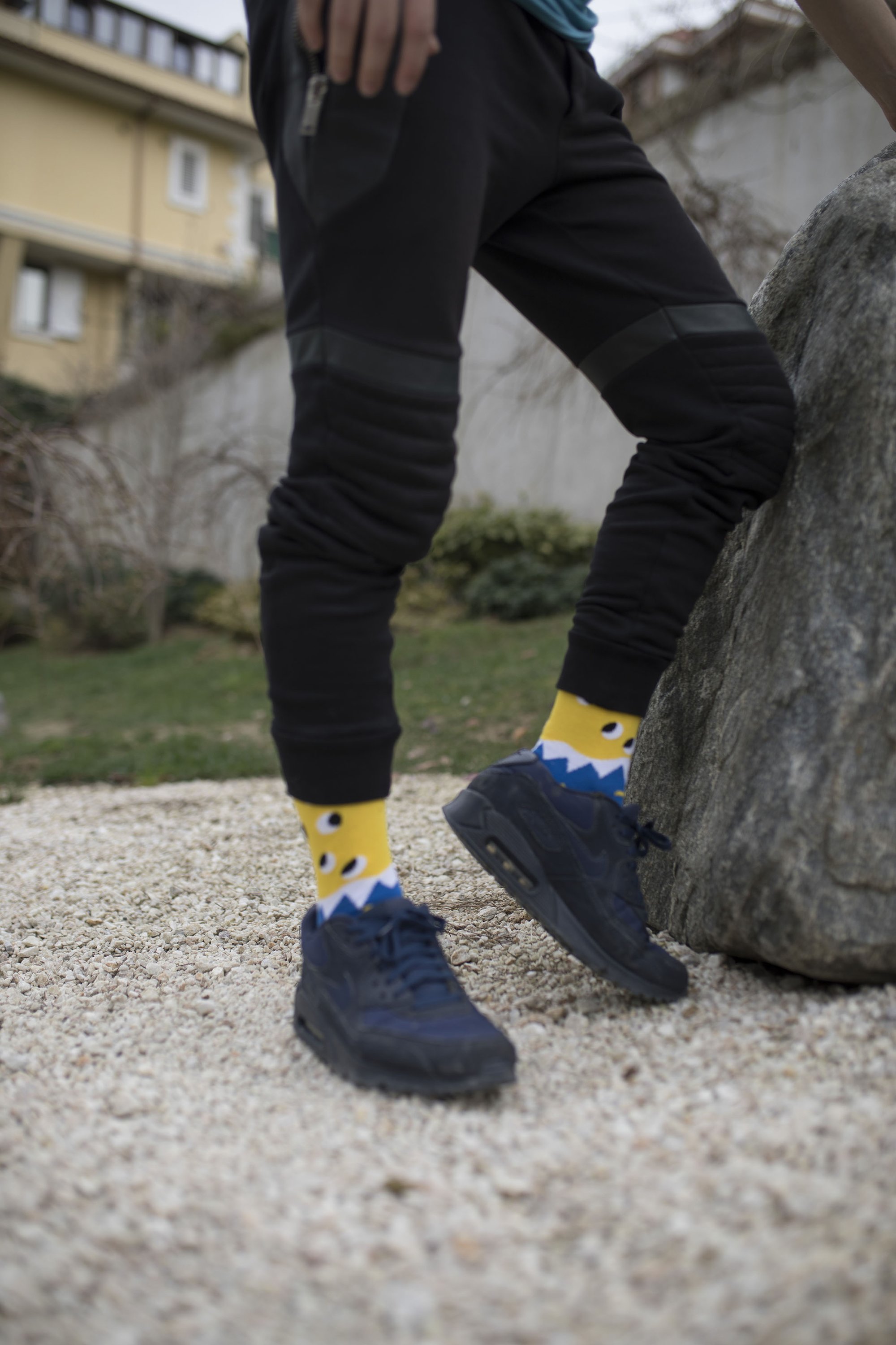 A pair of Men's Irregular Eyes Socks featuring a playful design with irregular eye patterns, made from soft combed cotton.