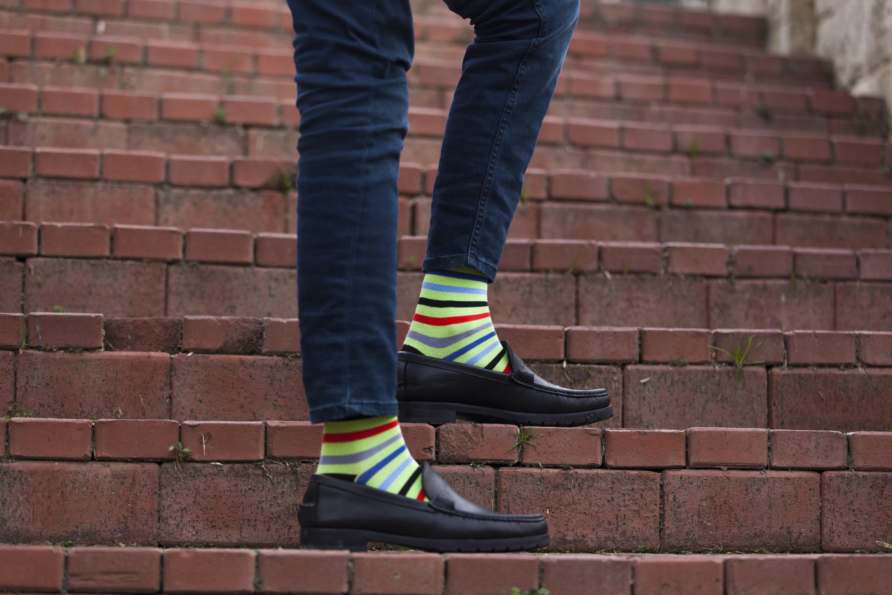 Men's Lime Stripe Socks featuring vibrant lime green stripes on a soft cotton blend fabric, perfect for adding style to any outfit.