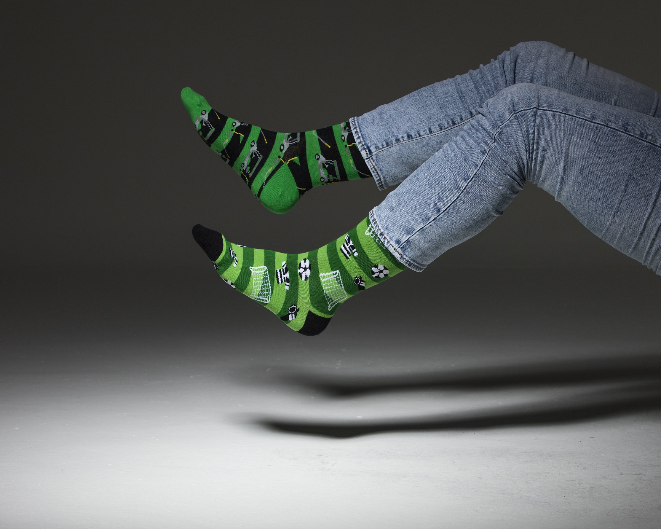 Men's Manly Sports Socks featuring colorful designs and premium cotton material for comfort and style.