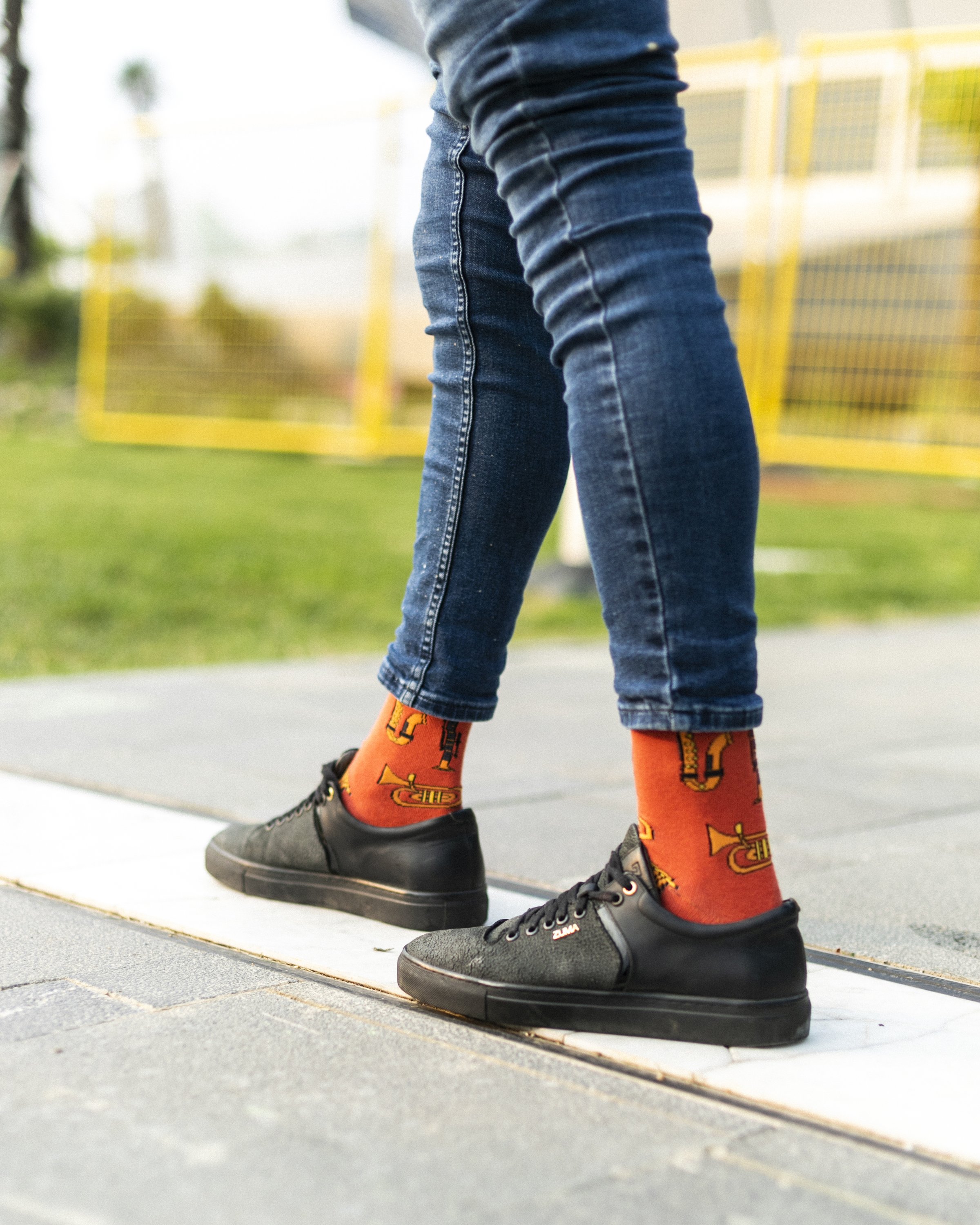 Colorful men's music socks featuring trendy patterns, perfect for adding a fun touch to any outfit.