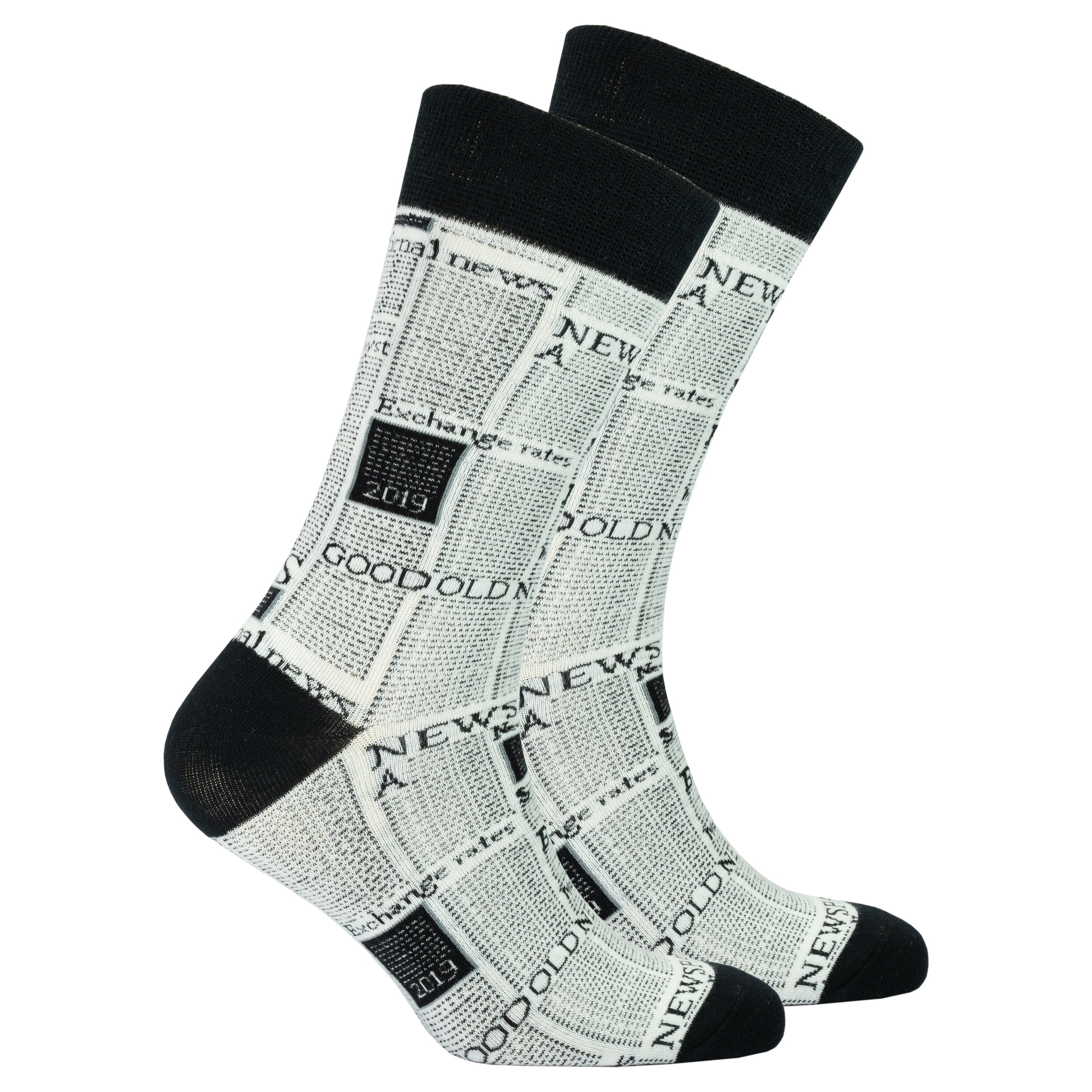 Men's Newspaper Socks featuring colorful designs and patterns, made from soft Turkish cotton for comfort and style.