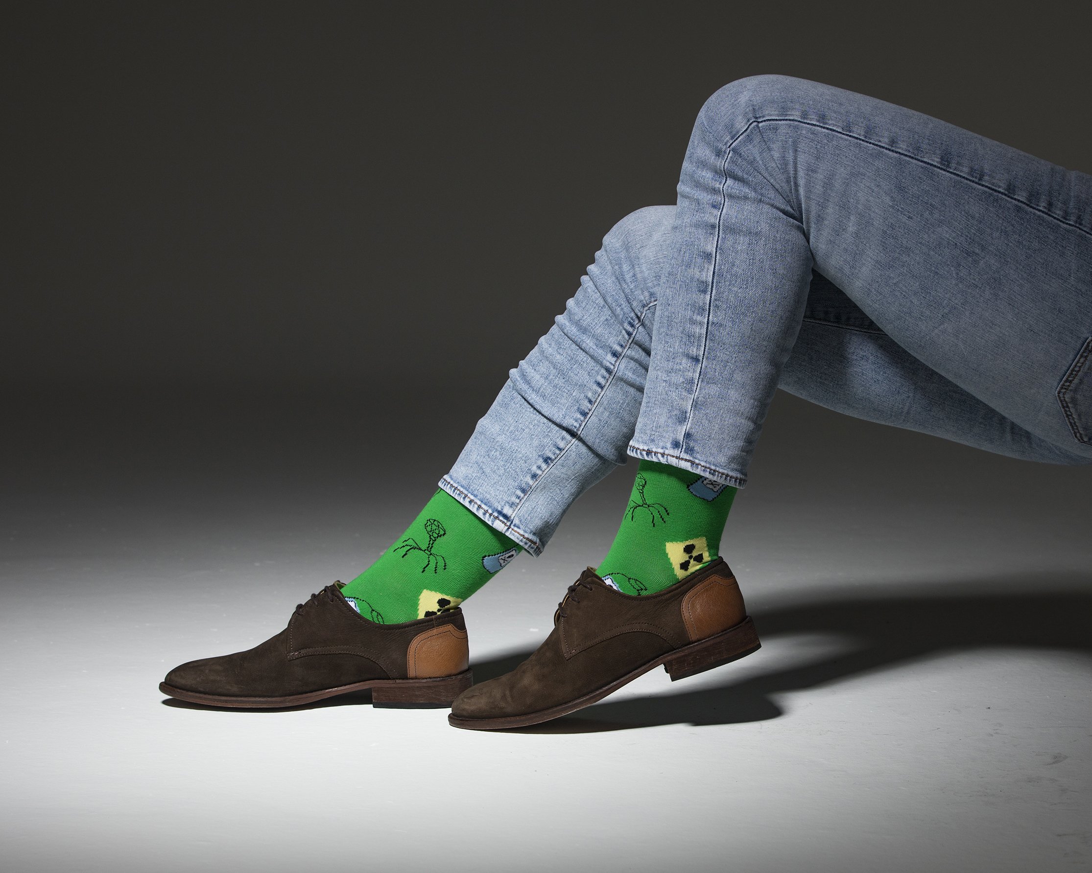 Men's Nuclear Socks featuring colorful patterns and premium cotton material, perfect for stylish comfort.