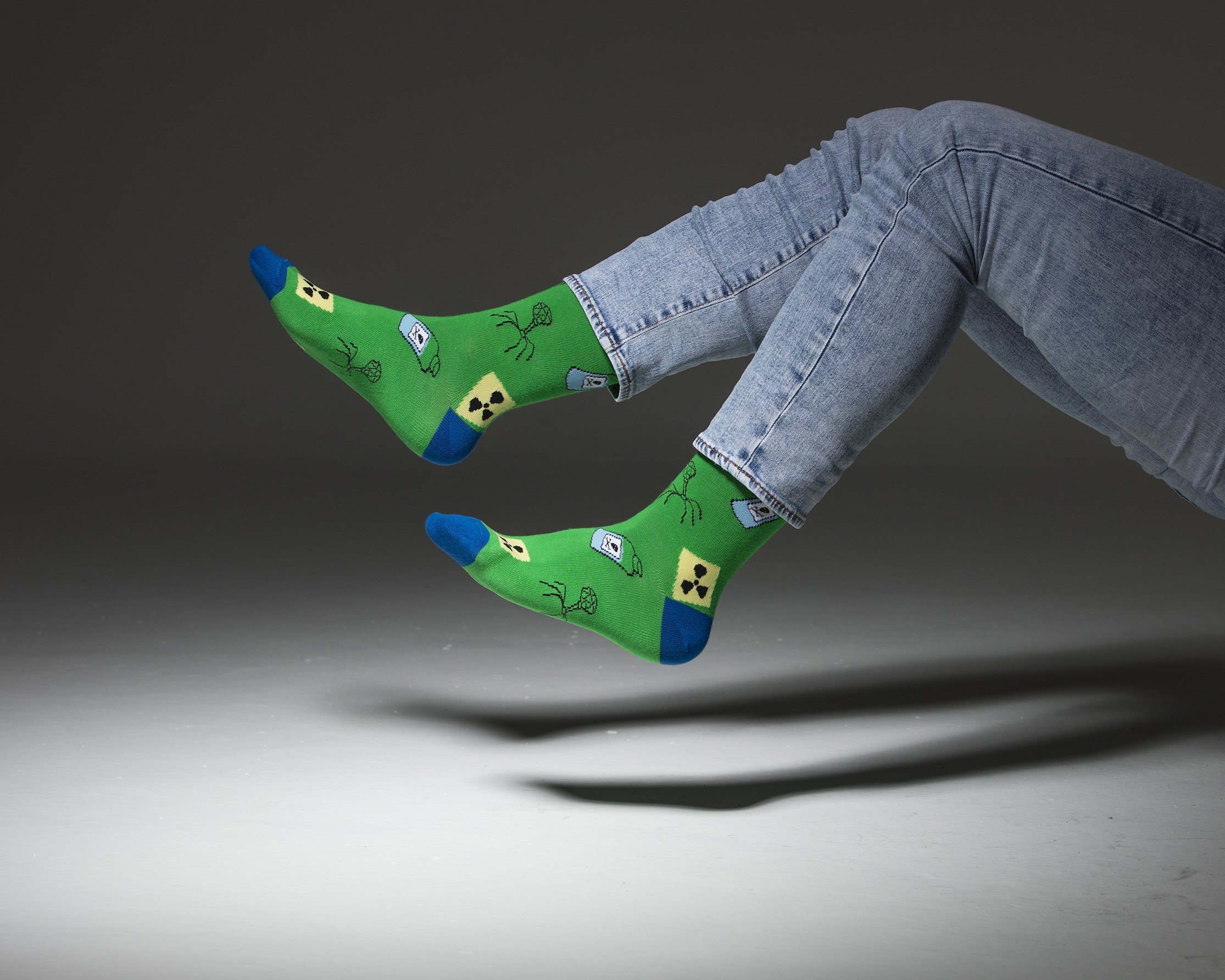 Men's Nuclear Socks featuring colorful patterns and premium cotton material, perfect for stylish comfort.