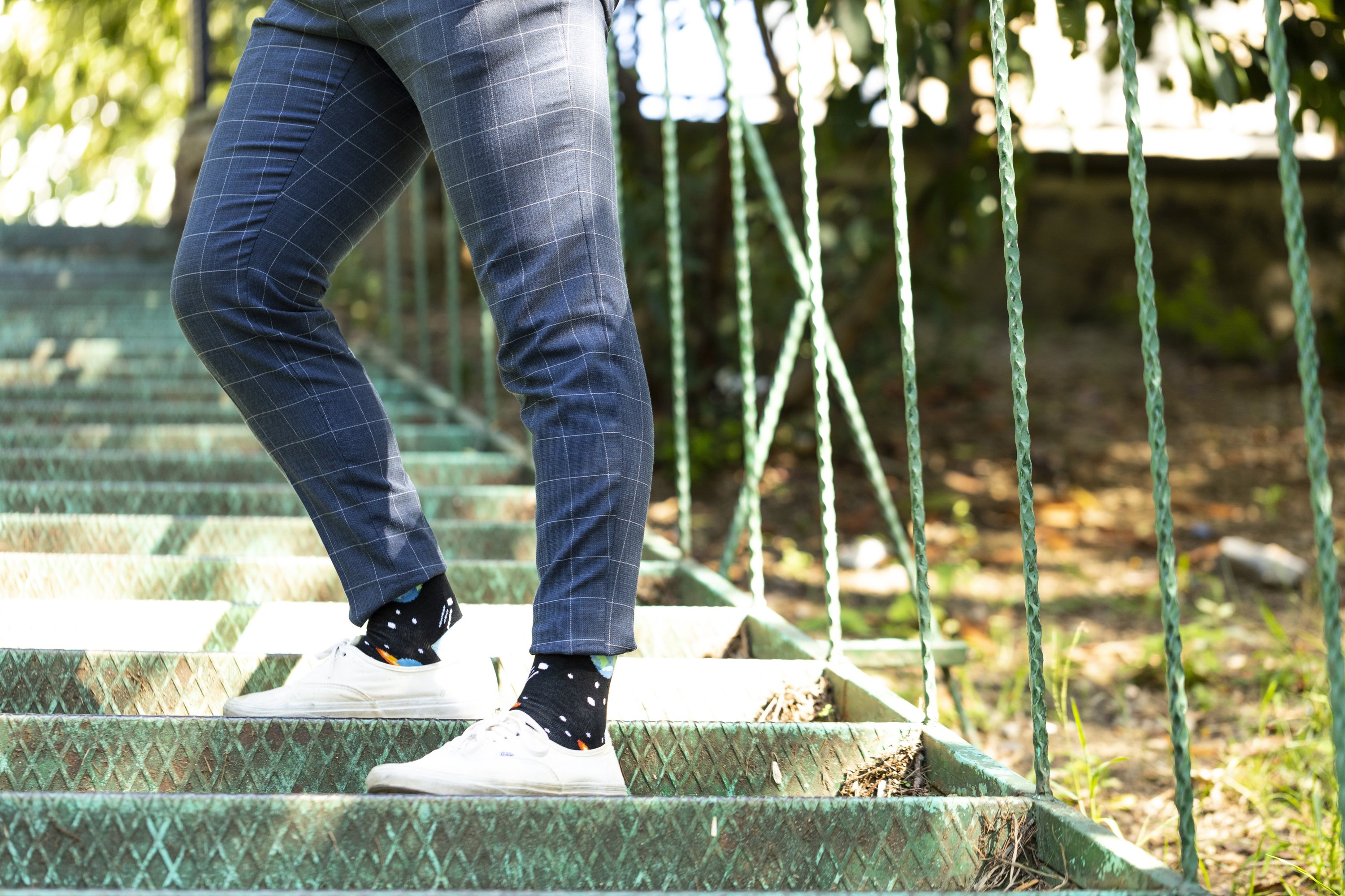 Men's Outer Space Socks featuring colorful designs and premium cotton material, perfect for adding style to any outfit.