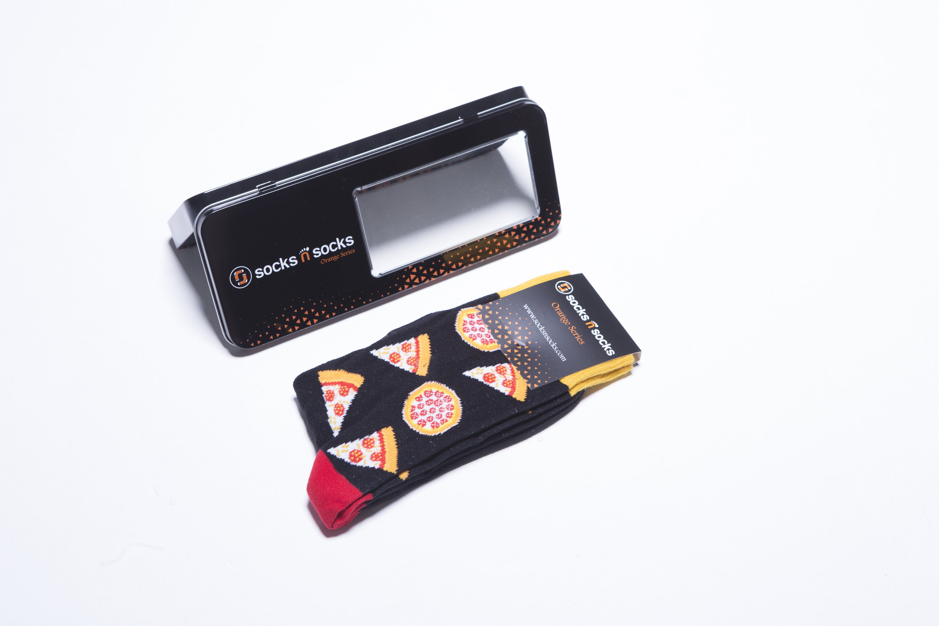 A pair of colorful men's socks featuring a fun pizza design, made from soft combed cotton.