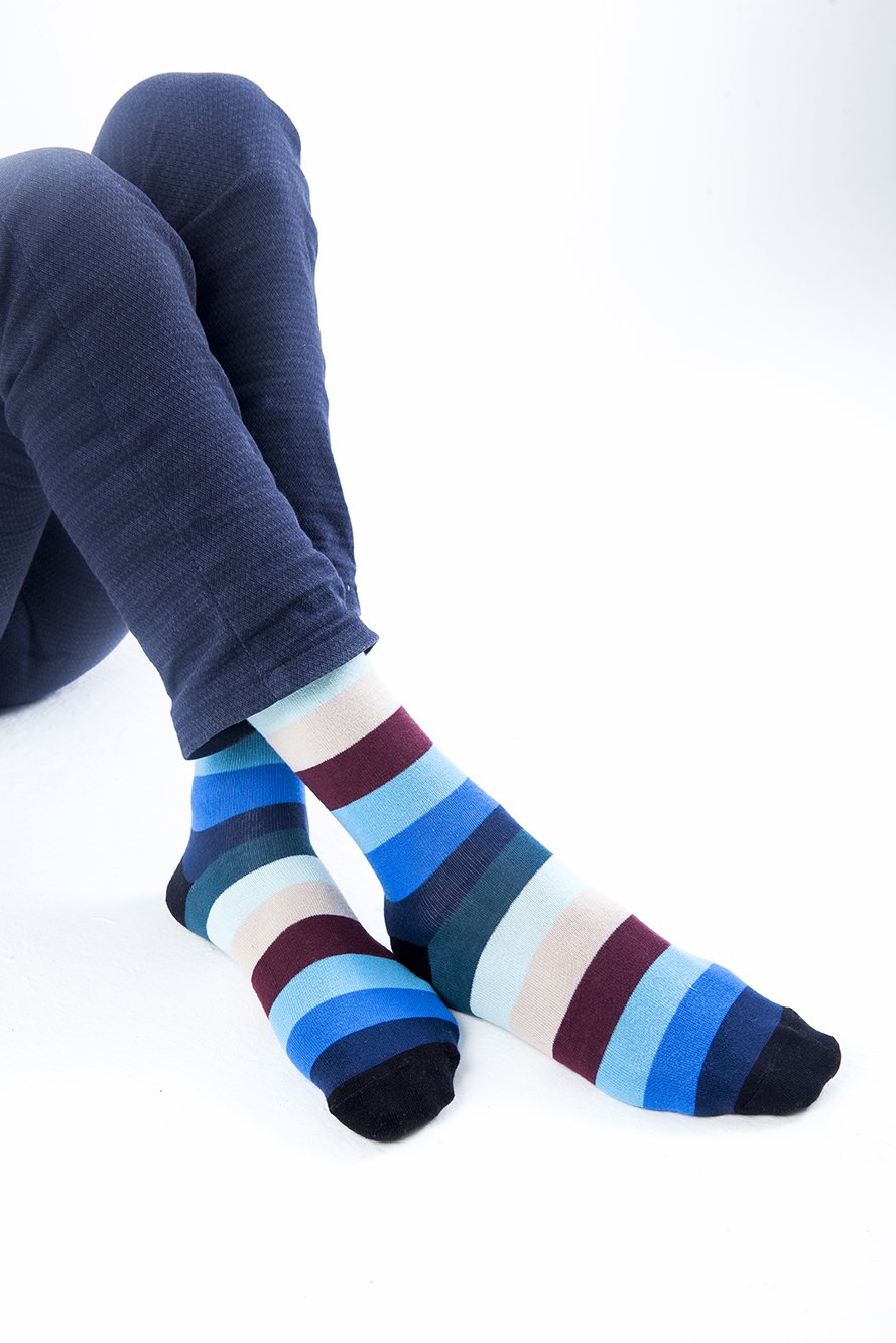 Men's Rainbow Stripes Socks featuring vibrant colors and patterns, made from soft Turkish cotton for comfort.