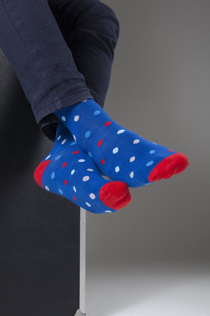 Men's Red Sea Dot Socks featuring a vibrant red color with playful dot patterns, made from soft Turkish cotton for comfort.