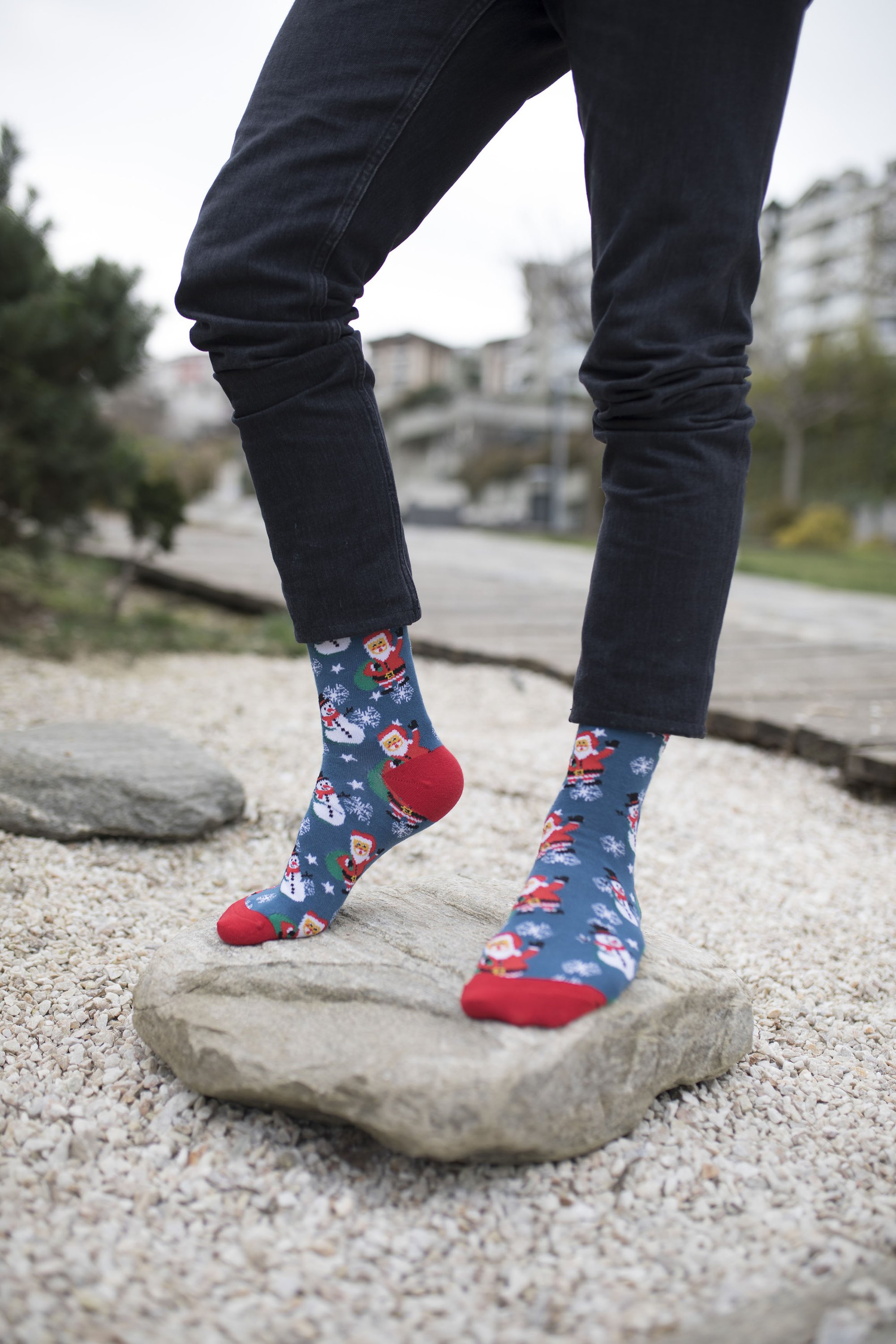 Men's Santa Socks featuring a festive design, made from soft combed cotton for comfort.