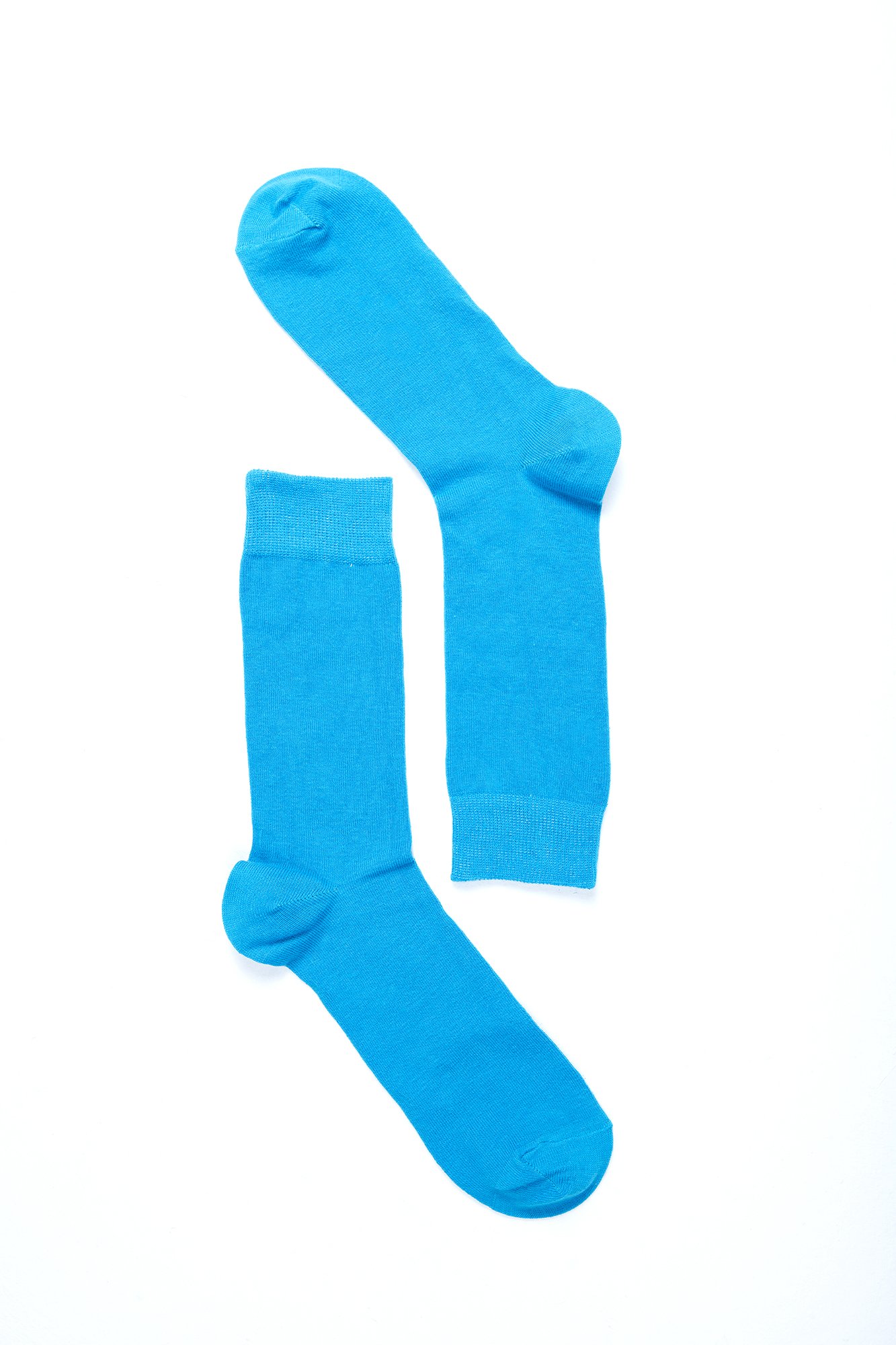 Men's Solid Blue Socks made from soft Turkish cotton, featuring a trendy design for comfort and style.