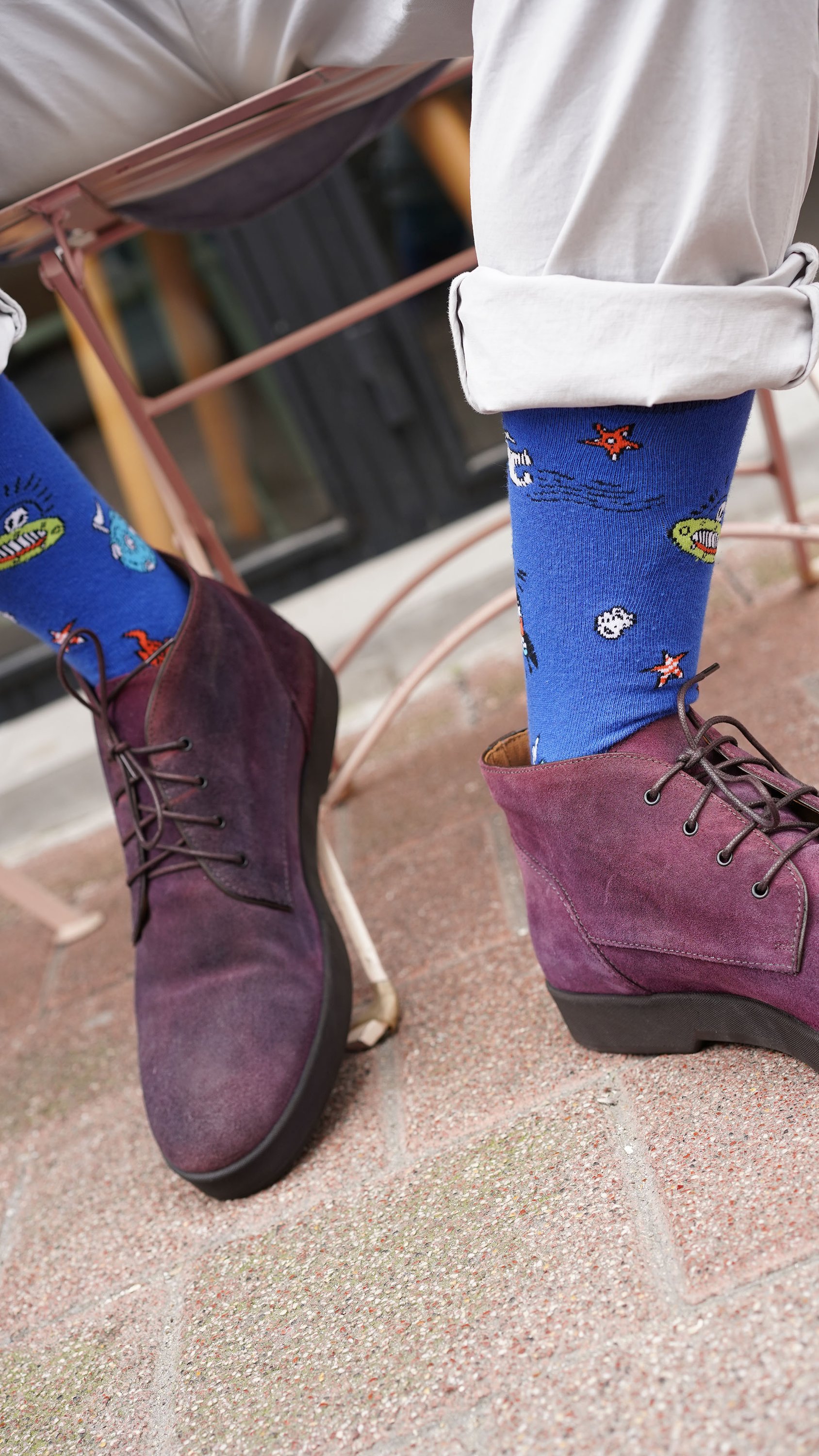 Men's Space Doodle Socks featuring colorful patterns and premium cotton material, perfect for adding a fun touch to any outfit.