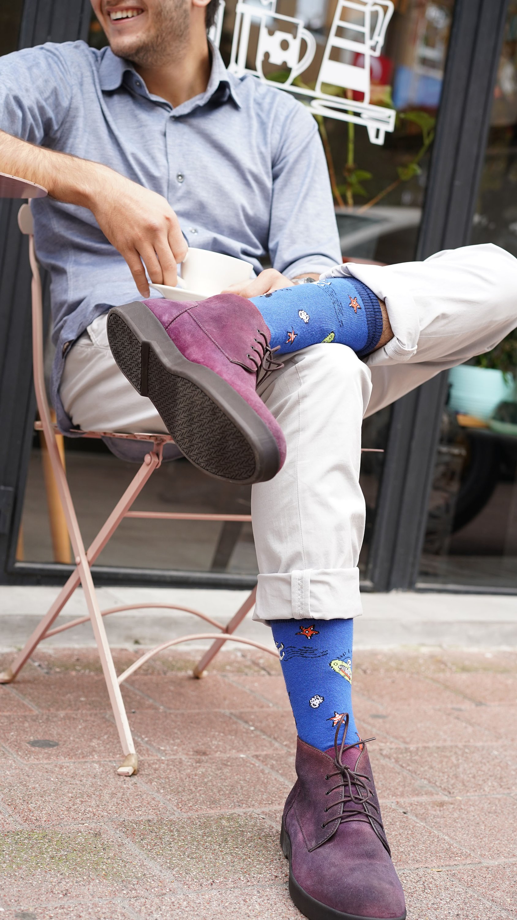 Men's Space Doodle Socks featuring colorful patterns and premium cotton material, perfect for adding a fun touch to any outfit.