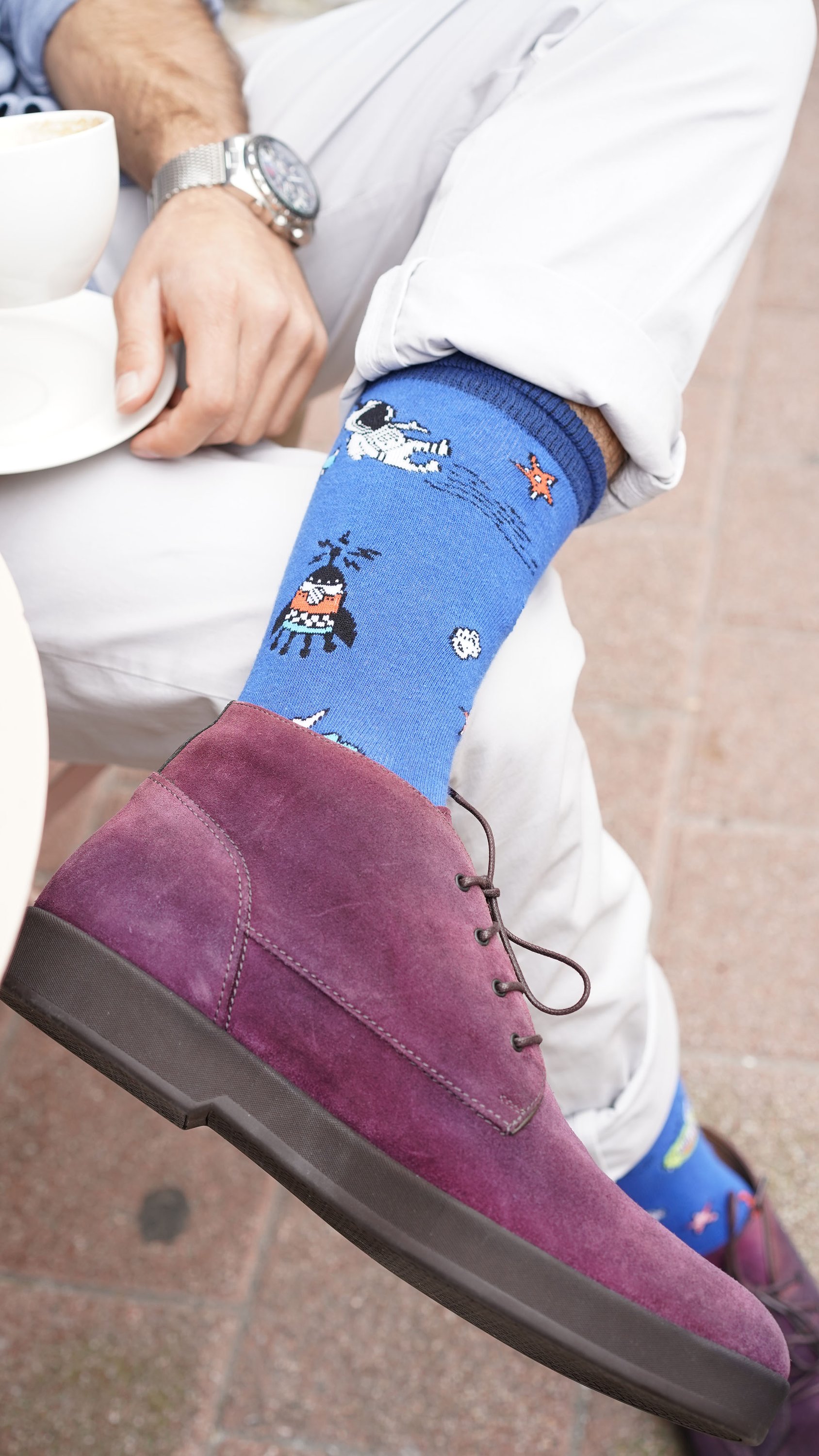 Men's Space Doodle Socks featuring colorful patterns and premium cotton material, perfect for adding a fun touch to any outfit.