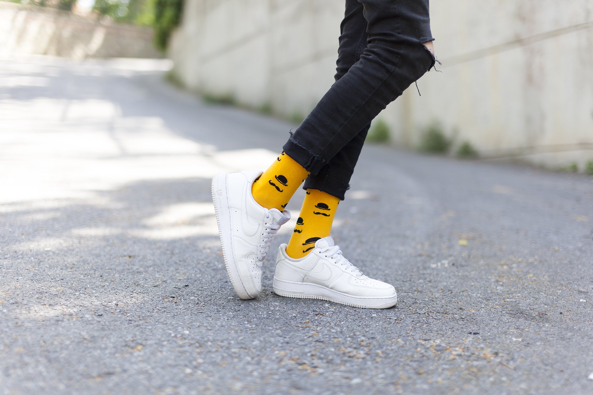 Men's Stache Socks featuring colorful designs and premium cotton material, perfect for adding a fun touch to any outfit.