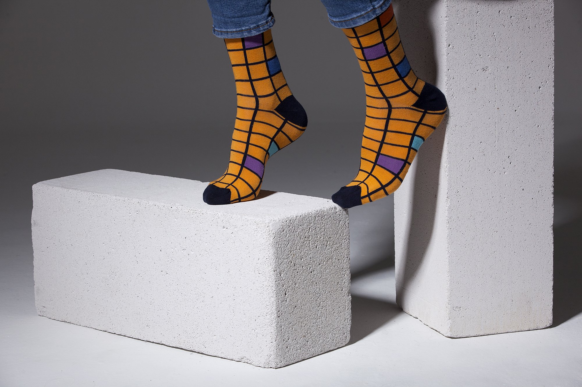 Men's Tangerine Square Socks featuring a vibrant square pattern, made from soft Turkish cotton for comfort and style.