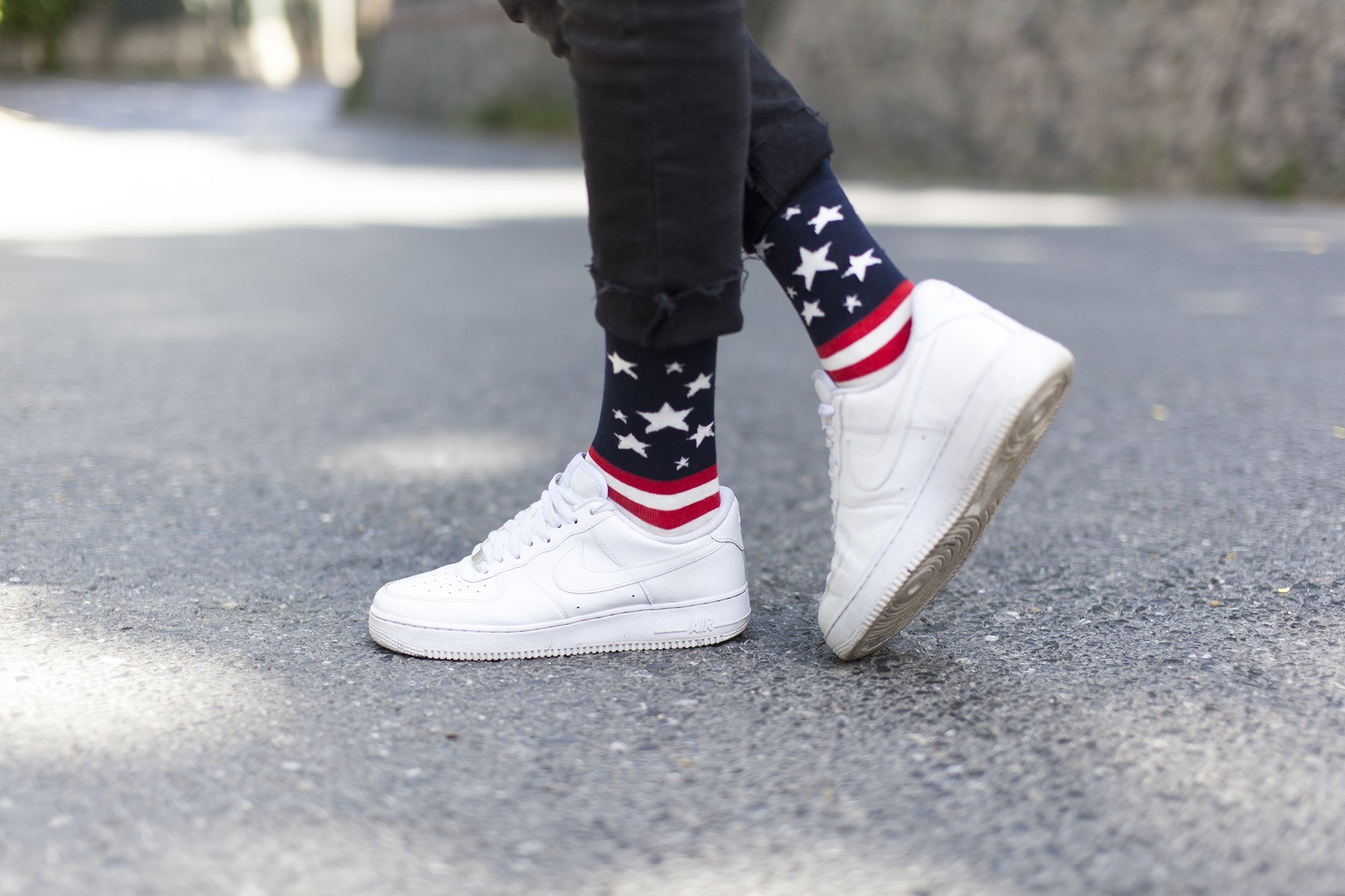 Men's USA Flag Stars Socks featuring vibrant colors and a trendy design, perfect for adding a fun touch to any outfit.