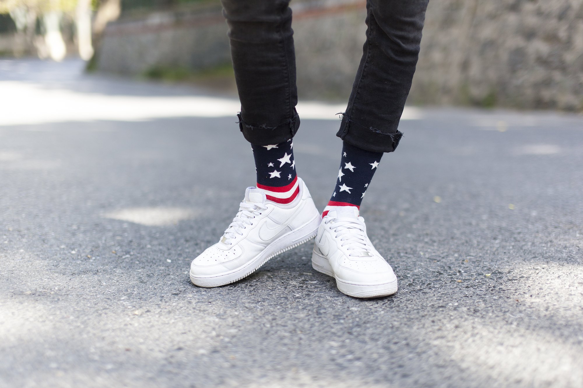 Men's USA Flag Stars Socks featuring vibrant colors and a trendy design, perfect for adding a fun touch to any outfit.