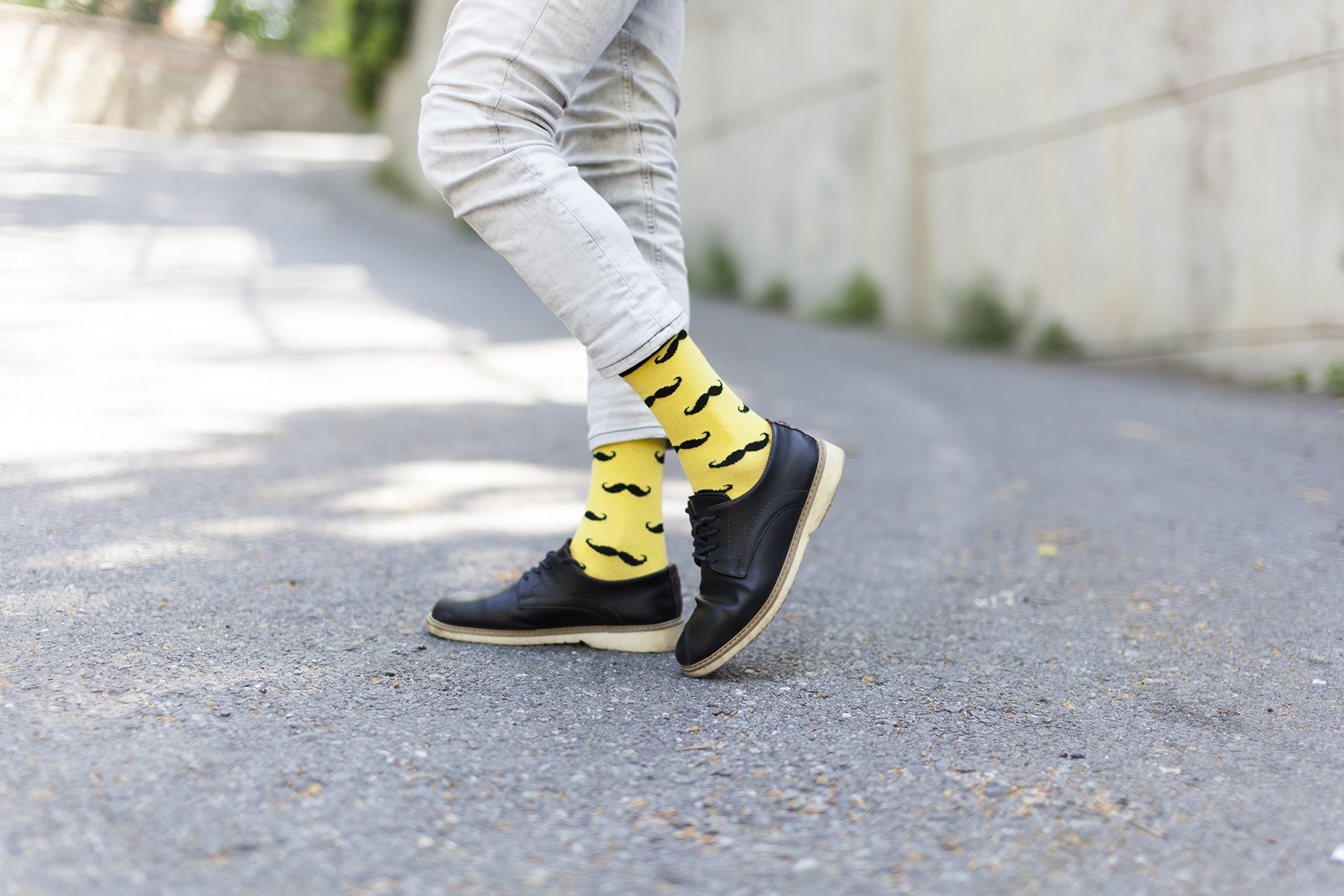 Men's Yellow Mustache Socks featuring a vibrant yellow color and playful mustache design, perfect for adding a fun touch to any outfit.