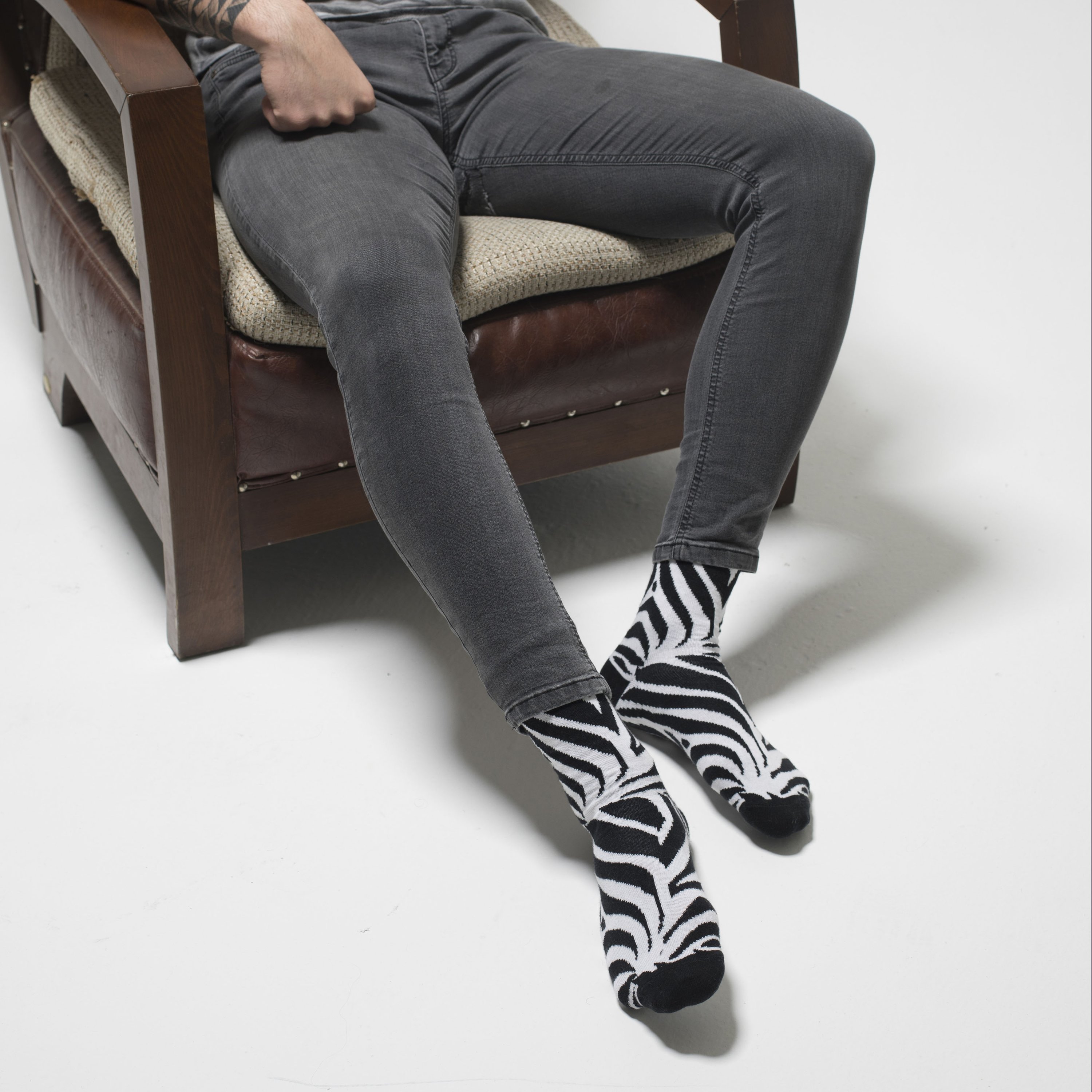 Men's Zebra Socks featuring a vibrant zebra pattern, made from soft Turkish cotton for comfort and style.