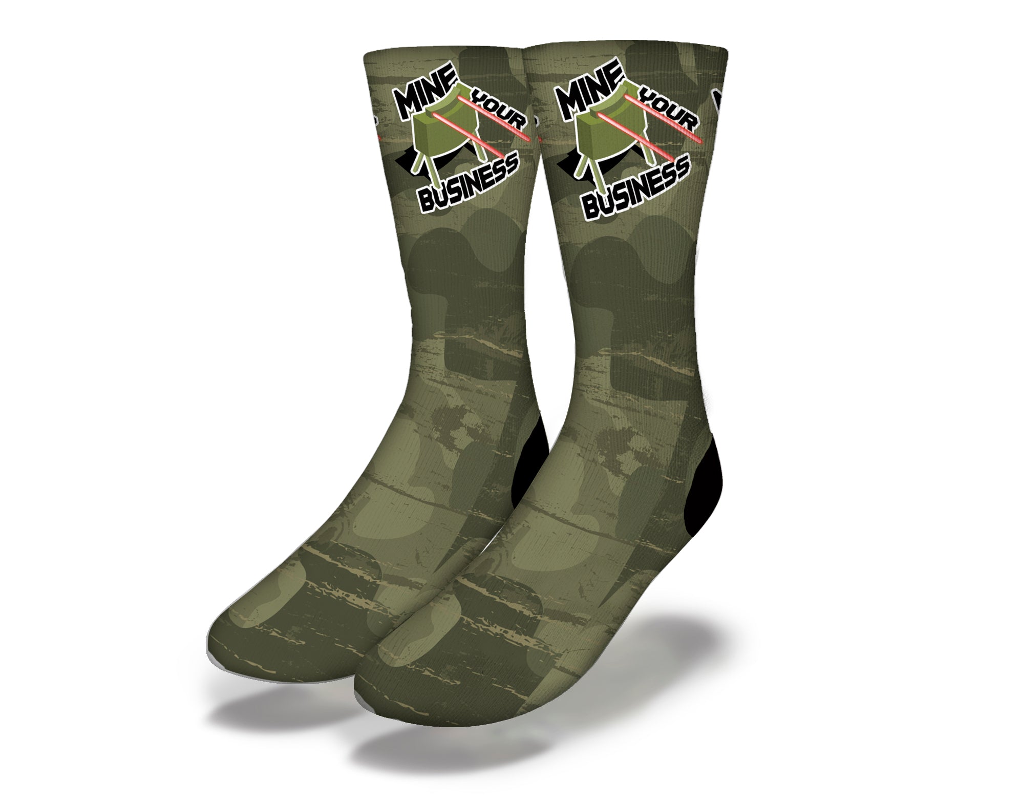 A pair of colorful Mine Your Business Socks featuring a playful design with the phrase 'Mine Your Business' printed on them.