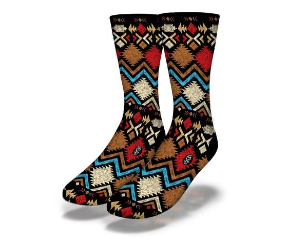 A pair of Native Pattern (style 4) socks featuring intricate designs and vibrant colors, showcasing their unique style and comfort.